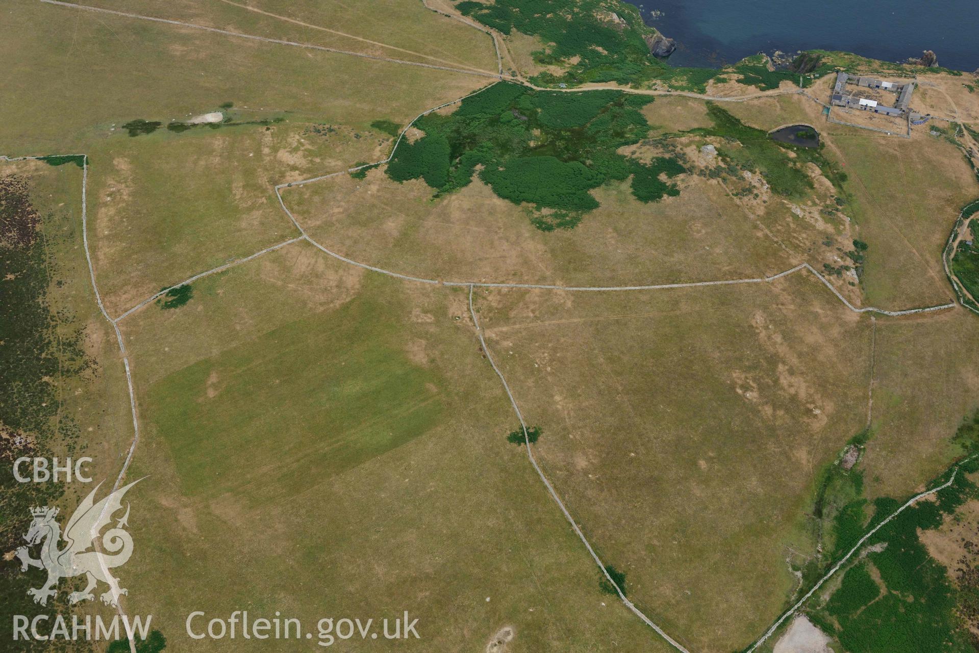 RCAHMW colour oblique aerial photograph of Ramsey Island, Ramsey Island Farm and St Tyfanog's chapel taken on 11 July 2018 by Toby Driver