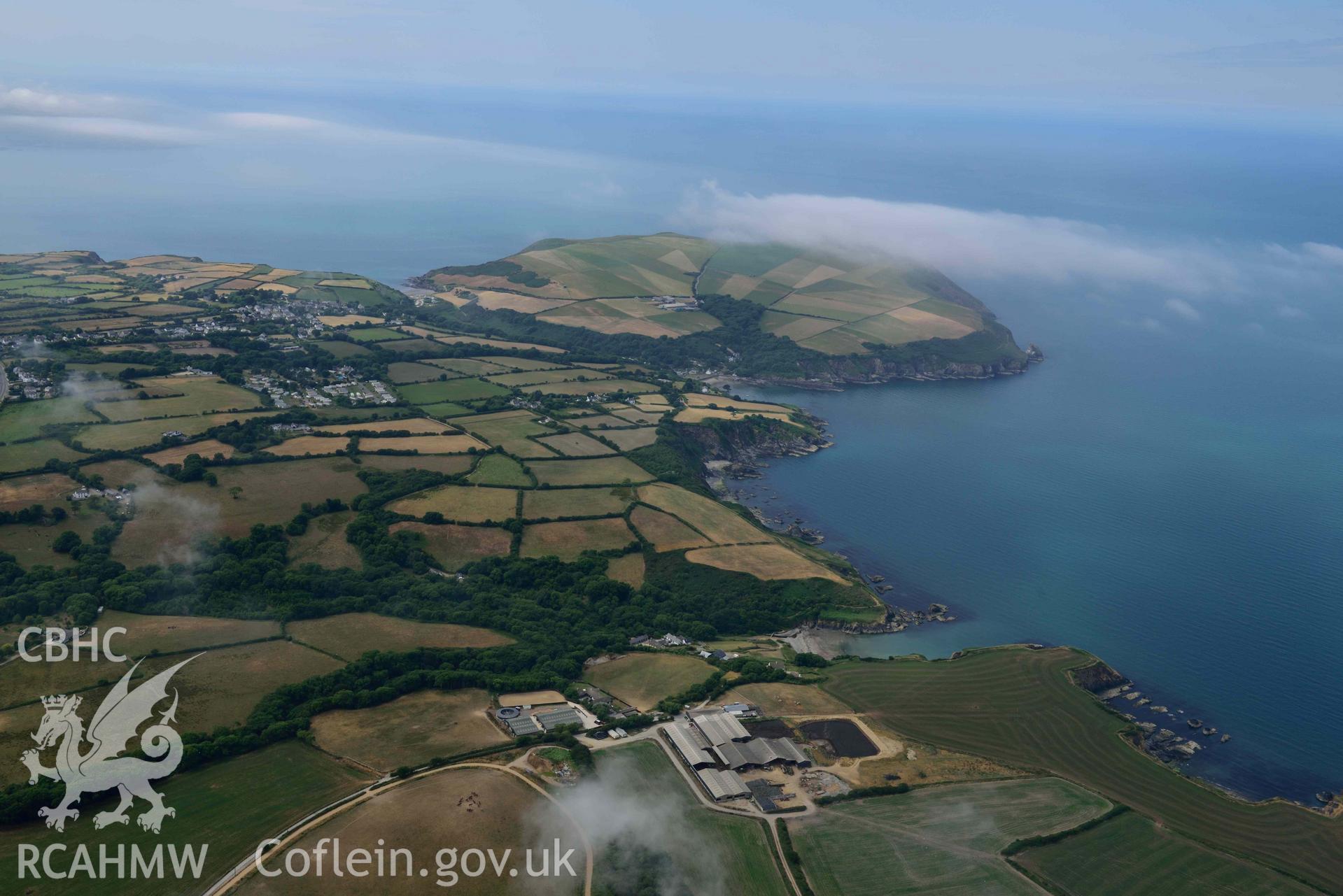 RCAHMW colour oblique aerial photograph of  Cwm yr Eglwys and Dinas Island, from East taken on 11 July 2018 by Toby Driver