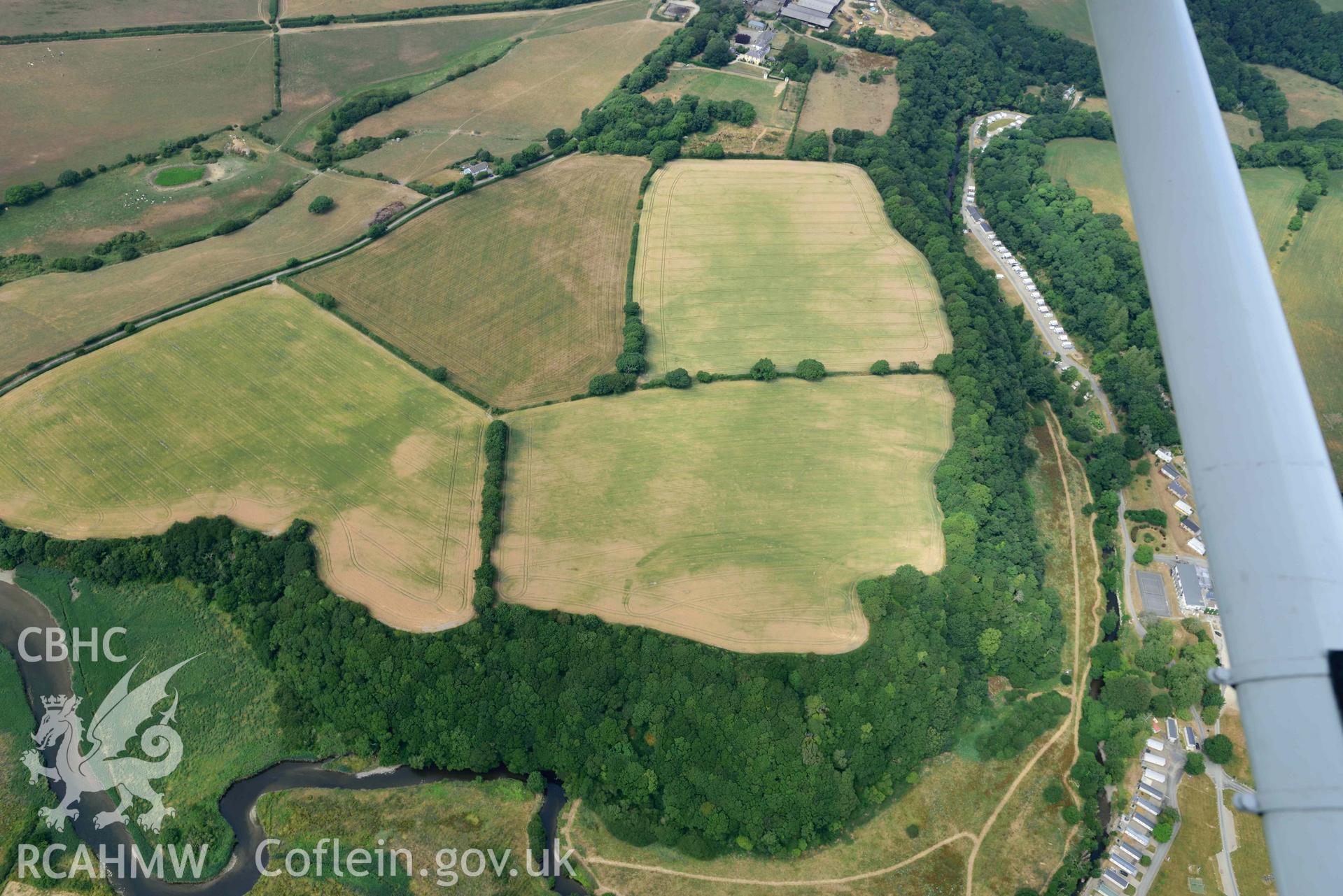 RCAHMW colour oblique aerial photograph of Berry Hill Wood, Inland Promontory Fort taken on 11 July 2018 by Toby Driver