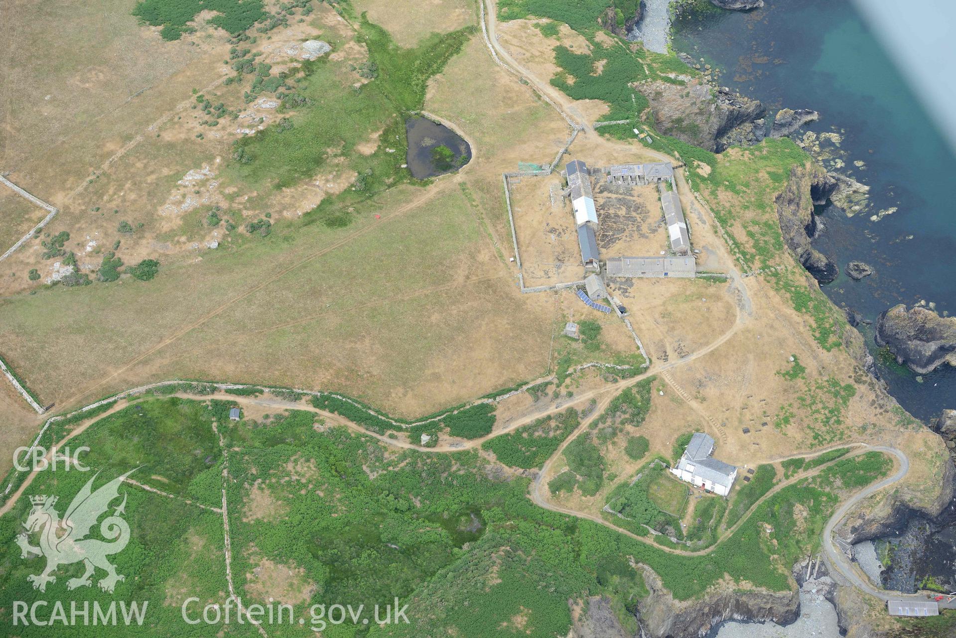 RCAHMW colour oblique aerial photograph of Ramsey Island, Ramsey Island Farm and St Tyfanog's chapel taken on 11 July 2018 by Toby Driver