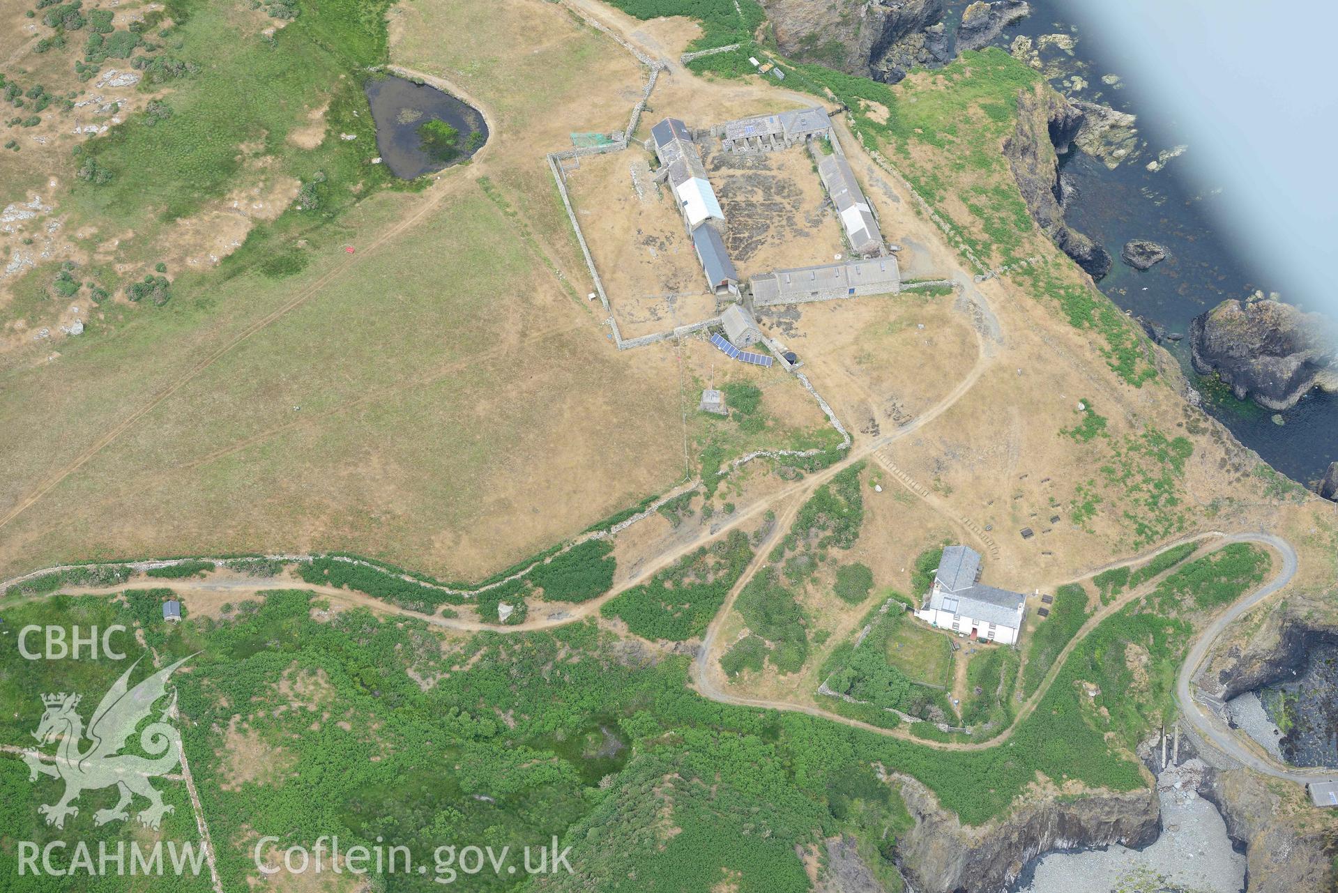 RCAHMW colour oblique aerial photograph of Ramsey Island, Ramsey Island Farm and St Tyfanog's chapel taken on 11 July 2018 by Toby Driver