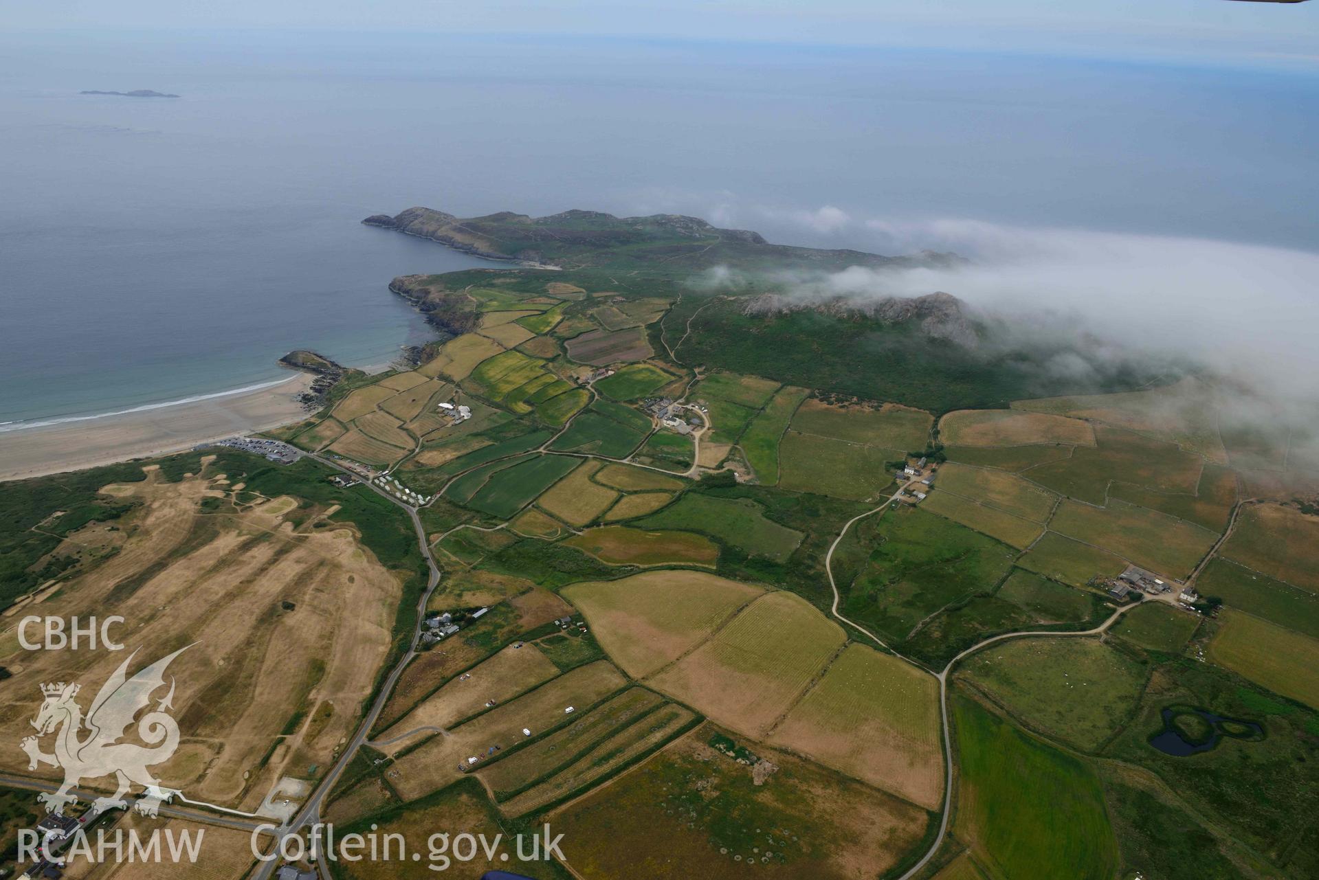 RCAHMW colour oblique aerial photograph of  St Patrick's Chapel, Whitesands Bay, general landscape taken on 11 July 2018 by Toby Driver