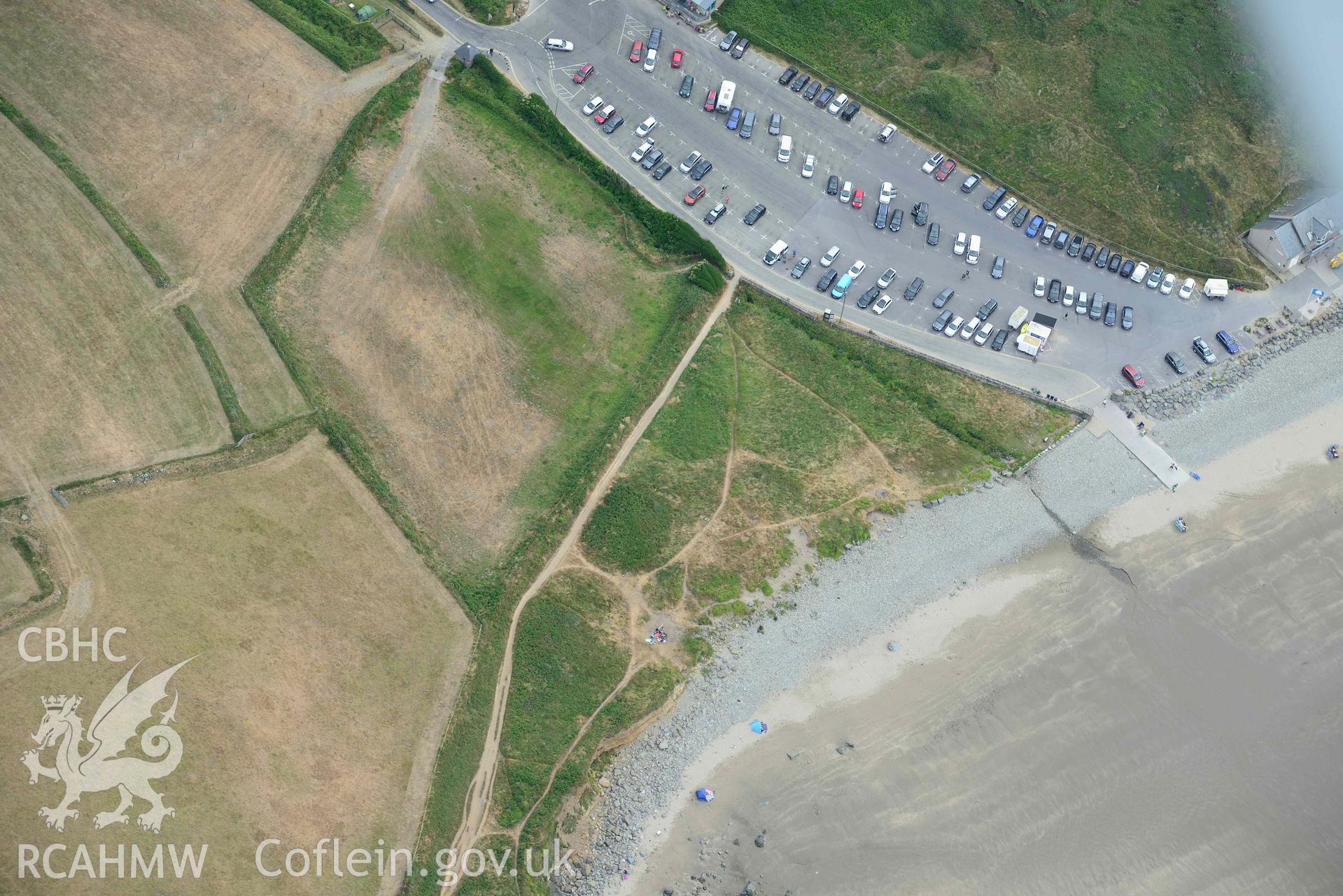 RCAHMW colour oblique aerial photograph of  St Patrick's Chapel taken on 11 July 2018 by Toby Driver