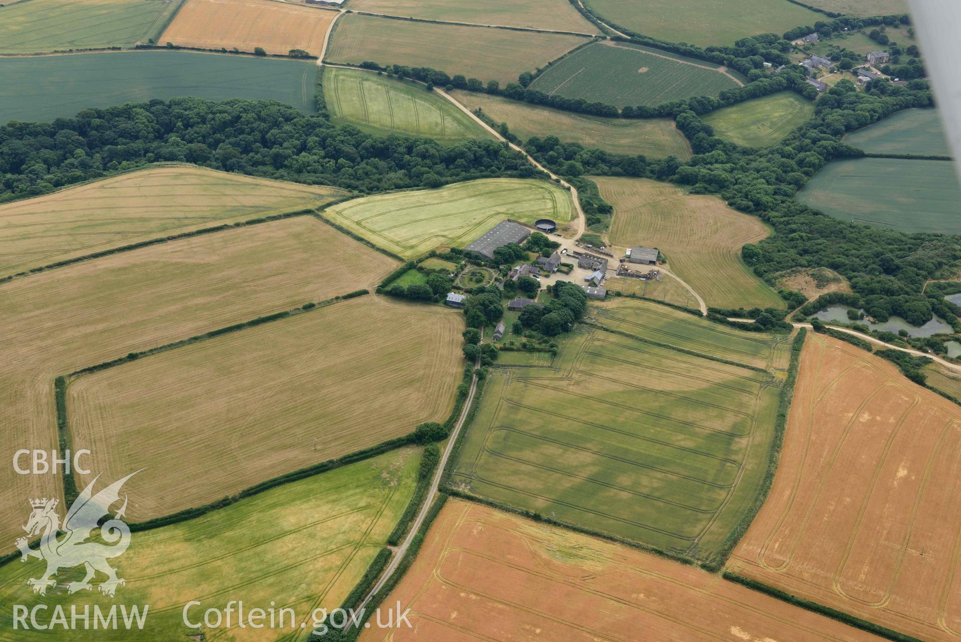 RCAHMW colour oblique aerial photograph of St Davids Church Brawdy taken on 11 July 2018 by Toby Driver