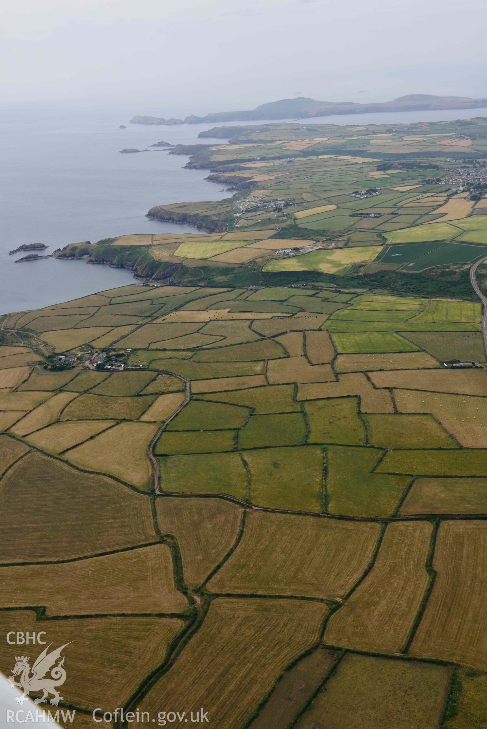 RCAHMW colour oblique aerial photograph of Landscape south of St Davids to  Ramsey Island taken on 11 July 2018 by Toby Driver