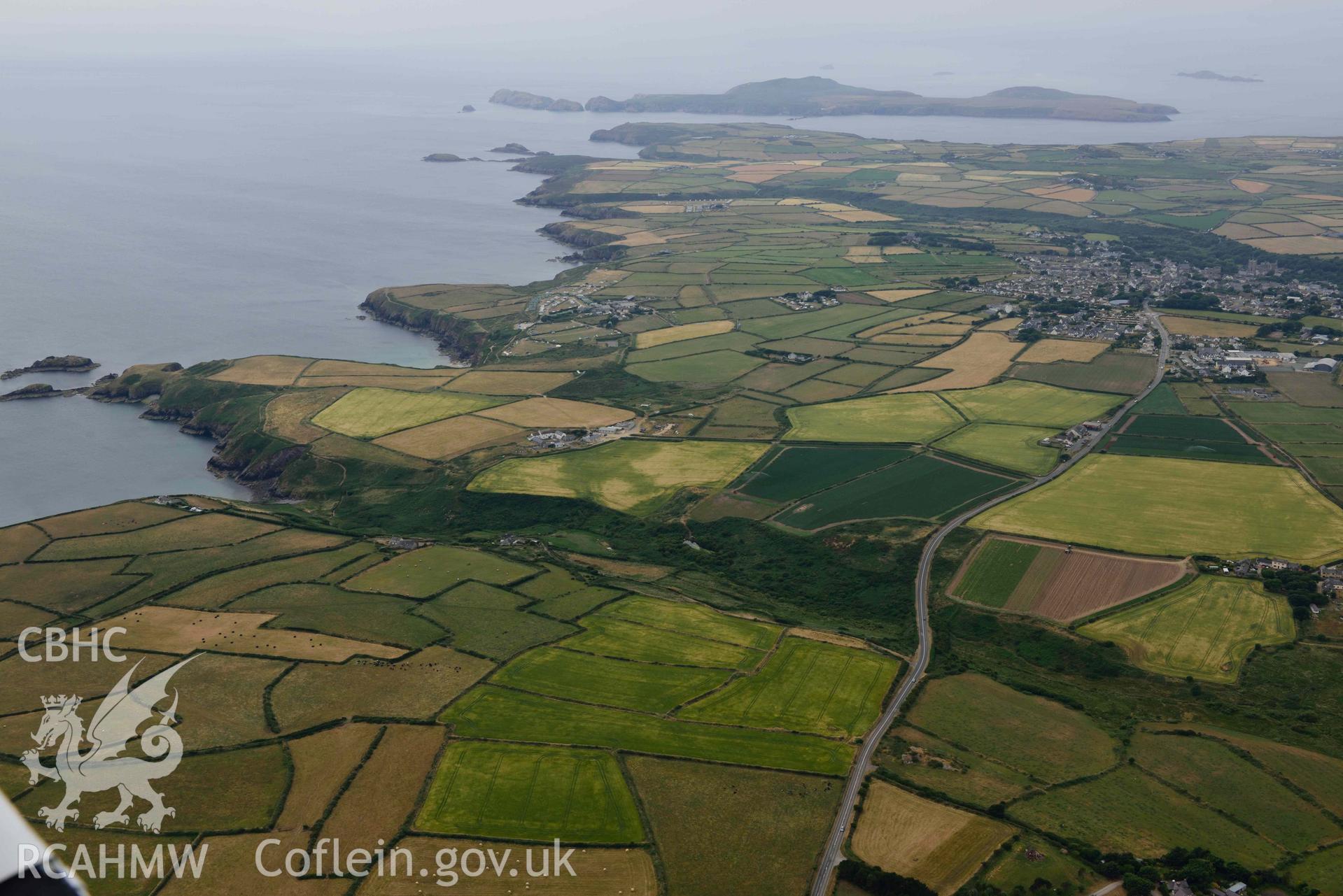 RCAHMW colour oblique aerial photograph of Landscape south of St Davids to  Ramsey Island taken on 11 July 2018 by Toby Driver