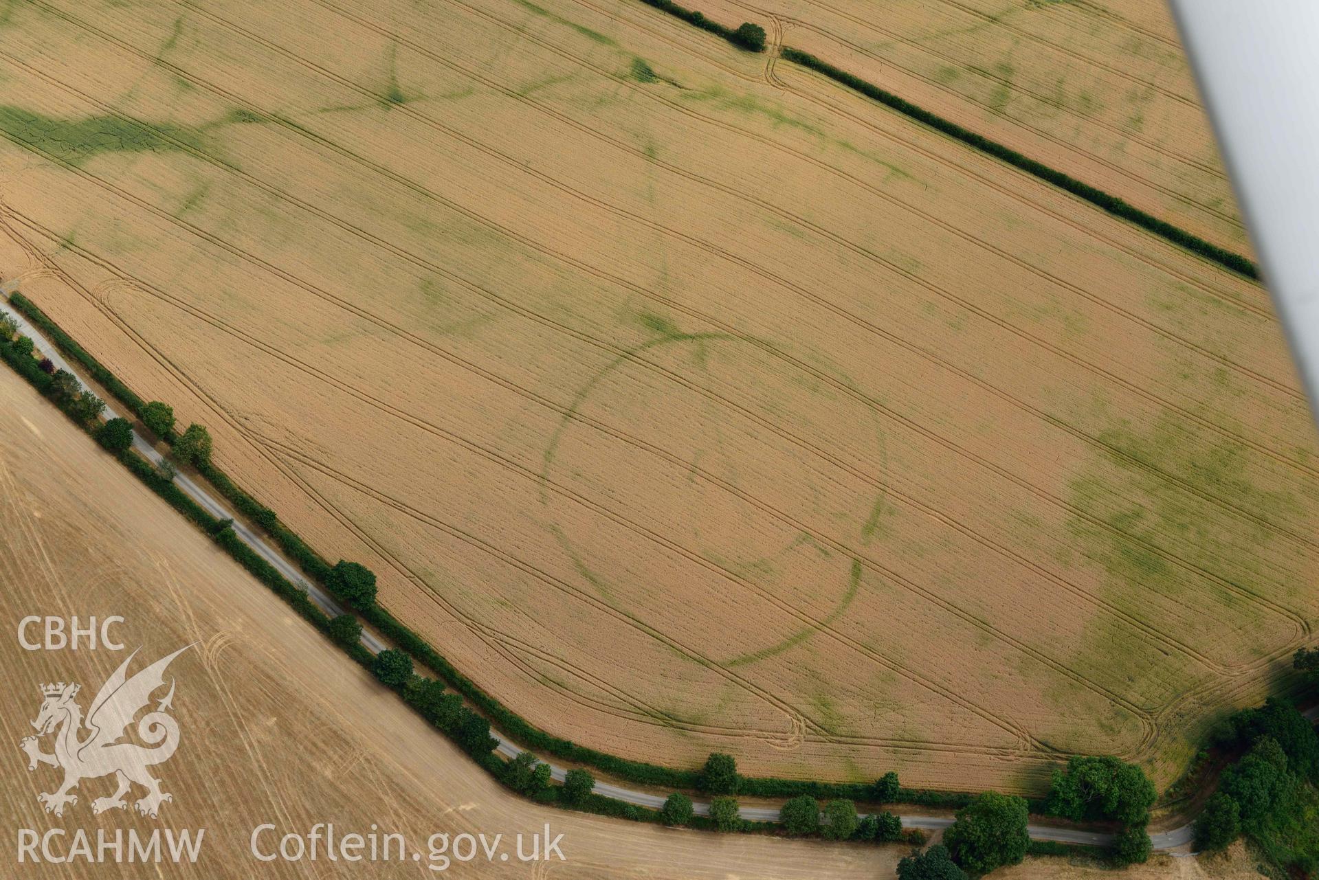 RCAHMW colour oblique aerial photograph of Cawrence enclosure taken on 11 July 2018 by Toby Driver