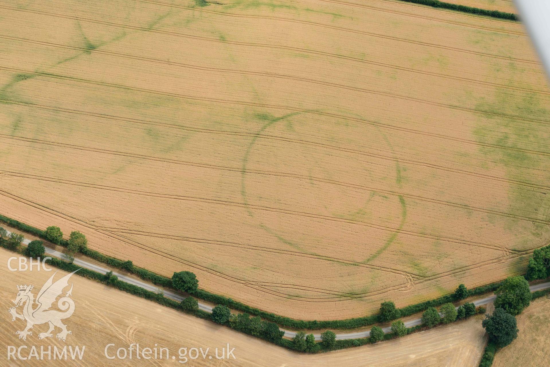 RCAHMW colour oblique aerial photograph of Cawrence enclosure taken on 11 July 2018 by Toby Driver