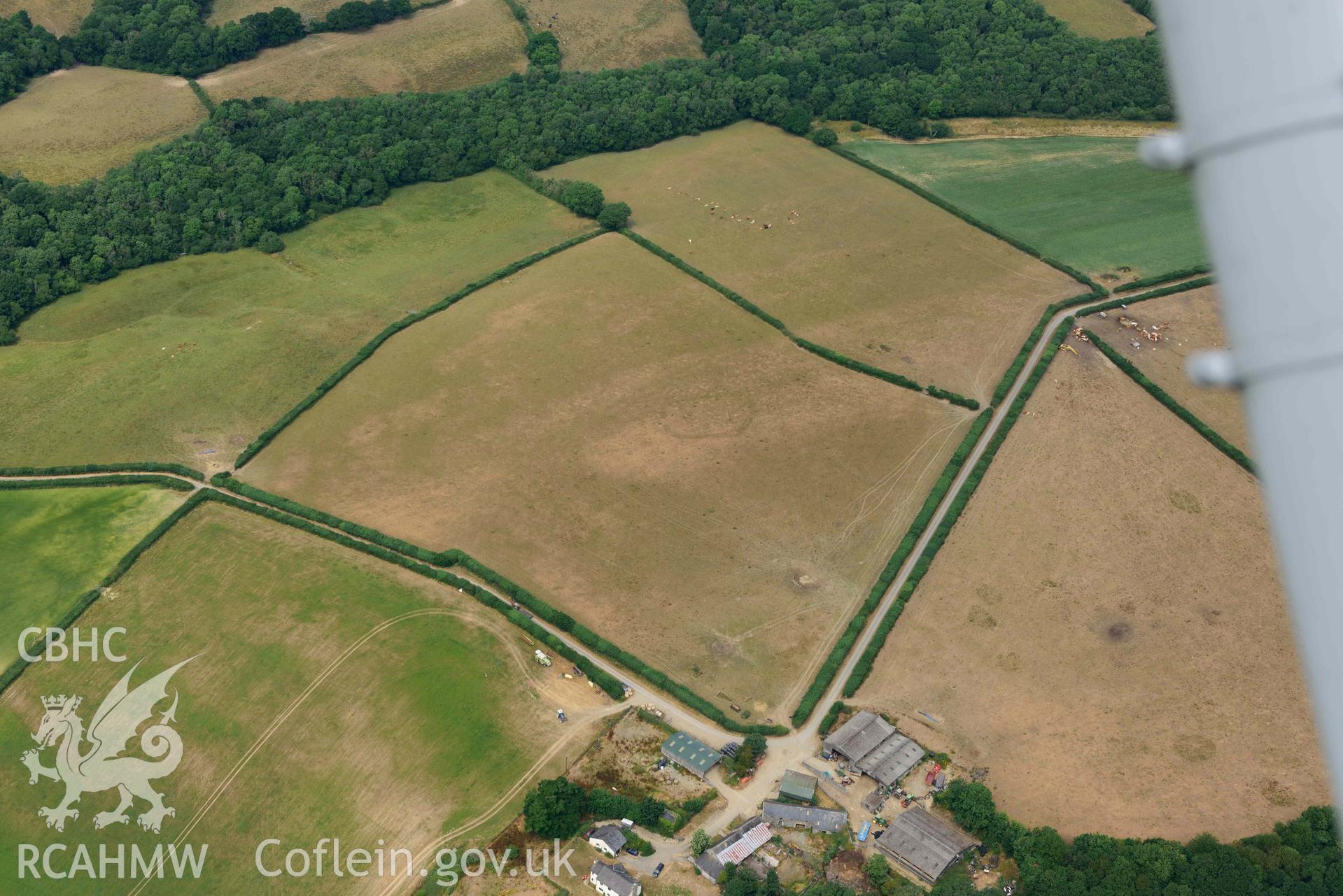 RCAHMW colour oblique aerial photograph of Penwernallt enclosure taken on 11 July 2018 by Toby Driver