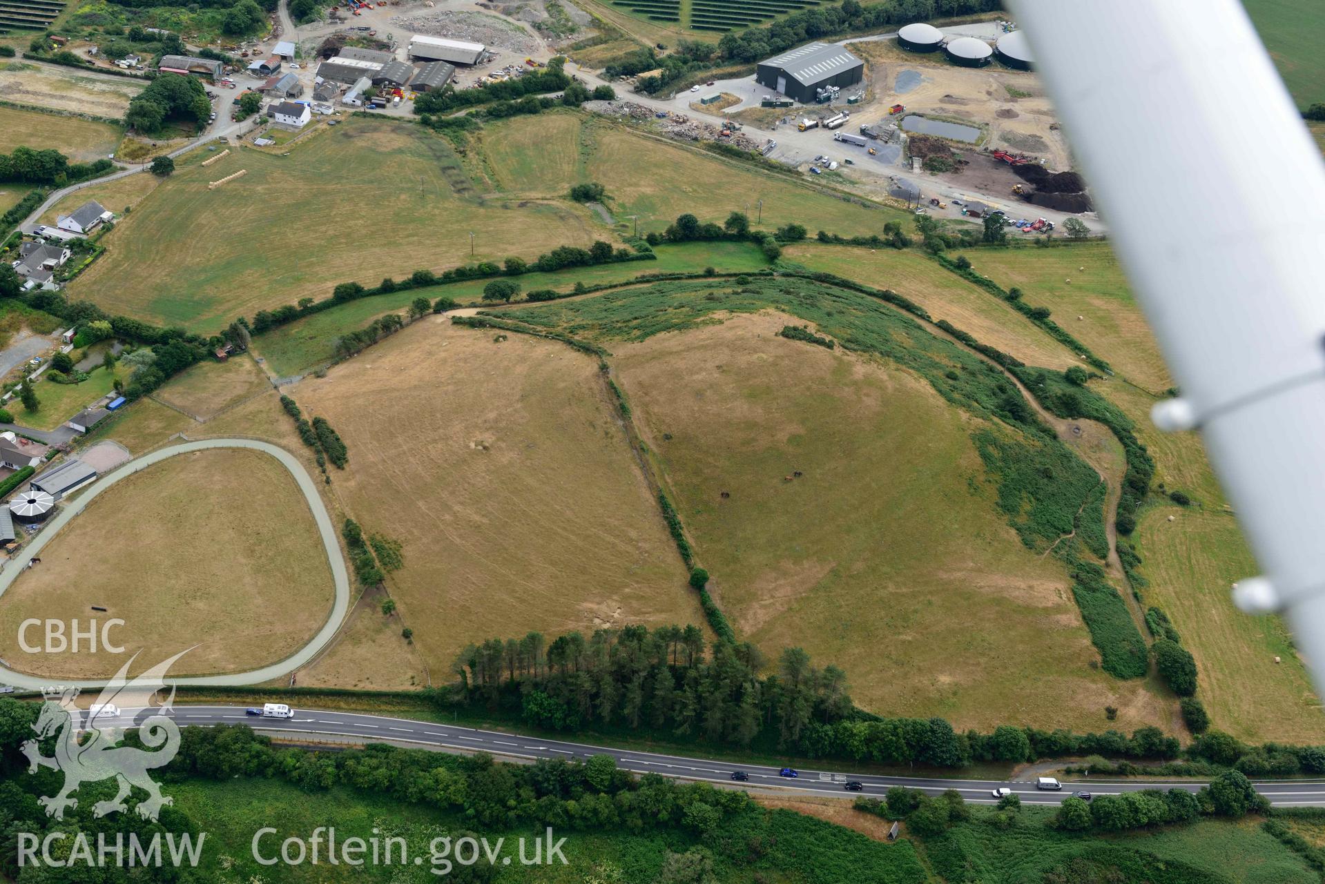 RCAHMW colour oblique aerial photograph of Banc y Warren hillfort taken on 11 July 2018 by Toby Driver