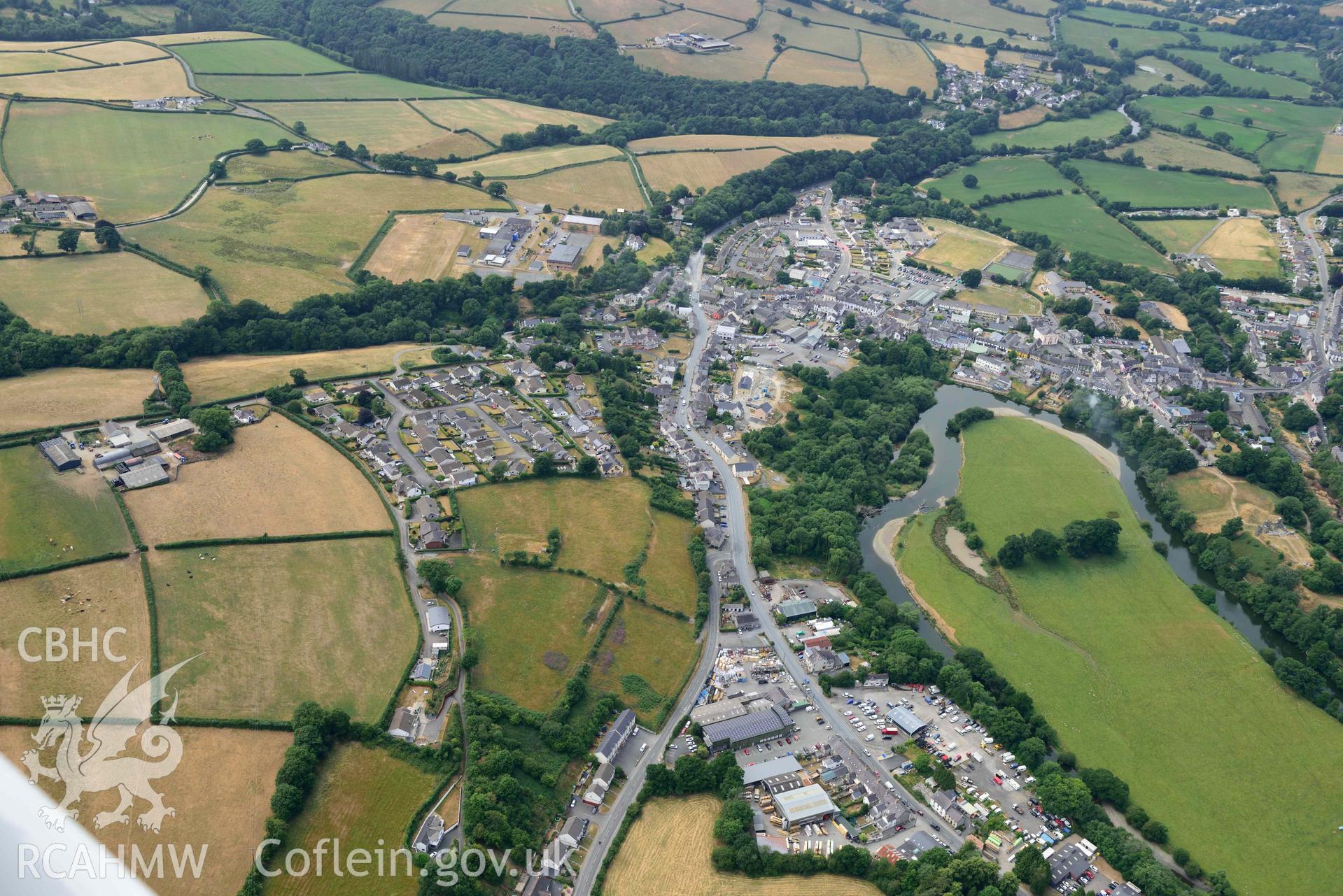 RCAHMW colour oblique aerial photograph of Newcastle Emlyn town & natural cropmarks to South taken on 11 July 2018 by Toby Driver