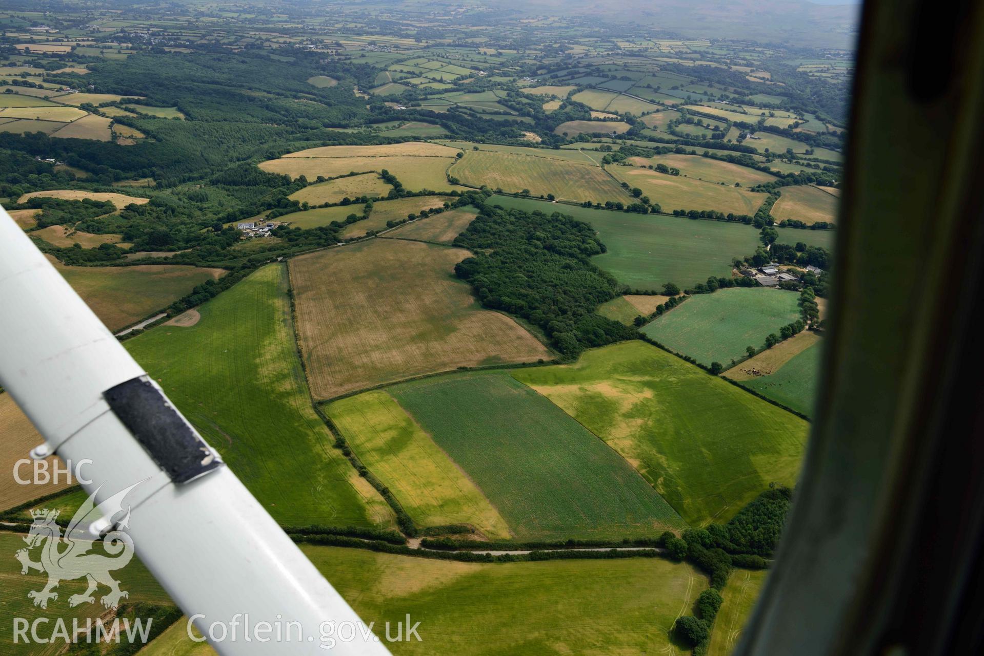 RCAHMW colour oblique aerial photograph of Round Barrows, Northeast of Dryslwyn taken on 11 July 2018 by Toby Driver