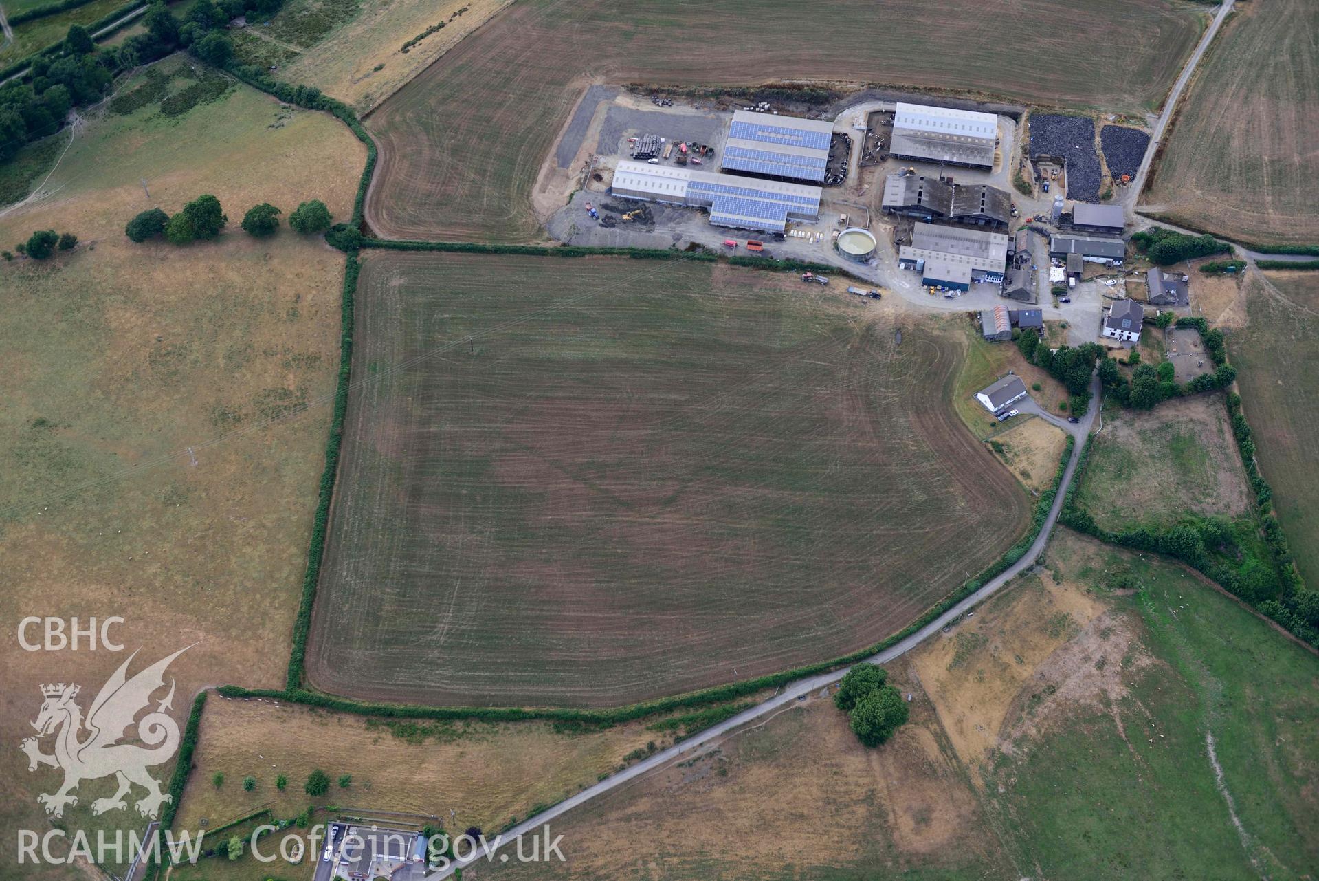 RCAHMW colour oblique aerial photograph of Trebersed enclosure or villa taken on 17 July 2018 by Toby Driver