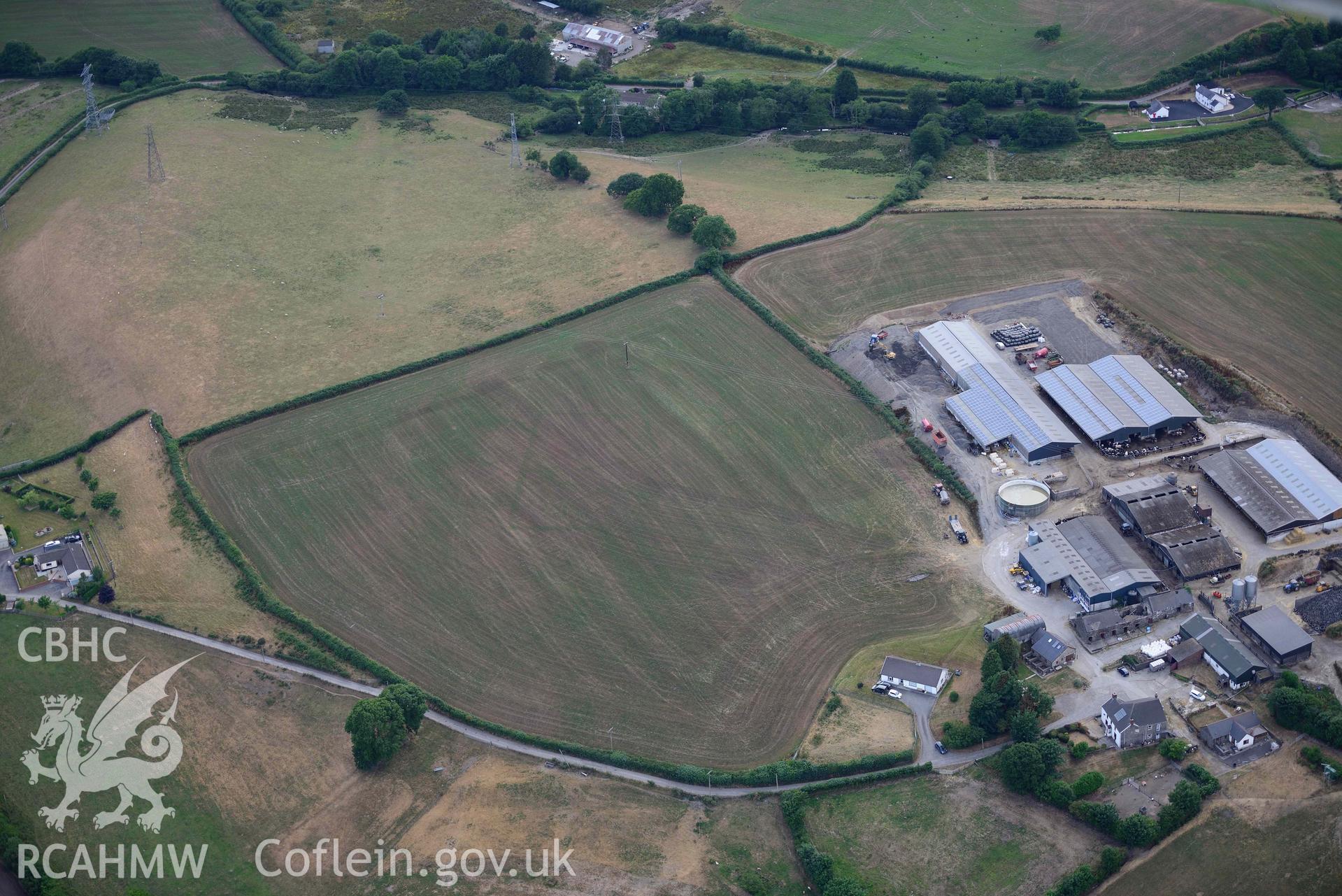 RCAHMW colour oblique aerial photograph of Trebersed enclosure or villa taken on 17 July 2018 by Toby Driver