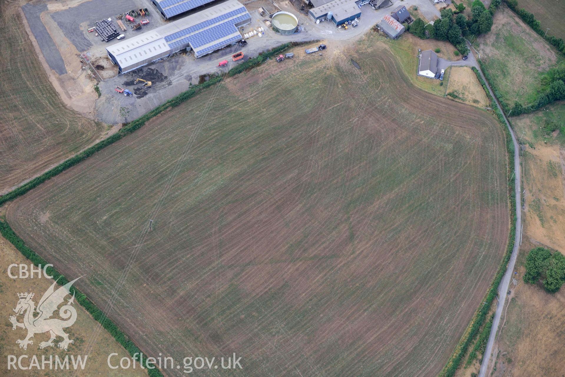 RCAHMW colour oblique aerial photograph of Trebersed enclosure or villa taken on 17 July 2018 by Toby Driver