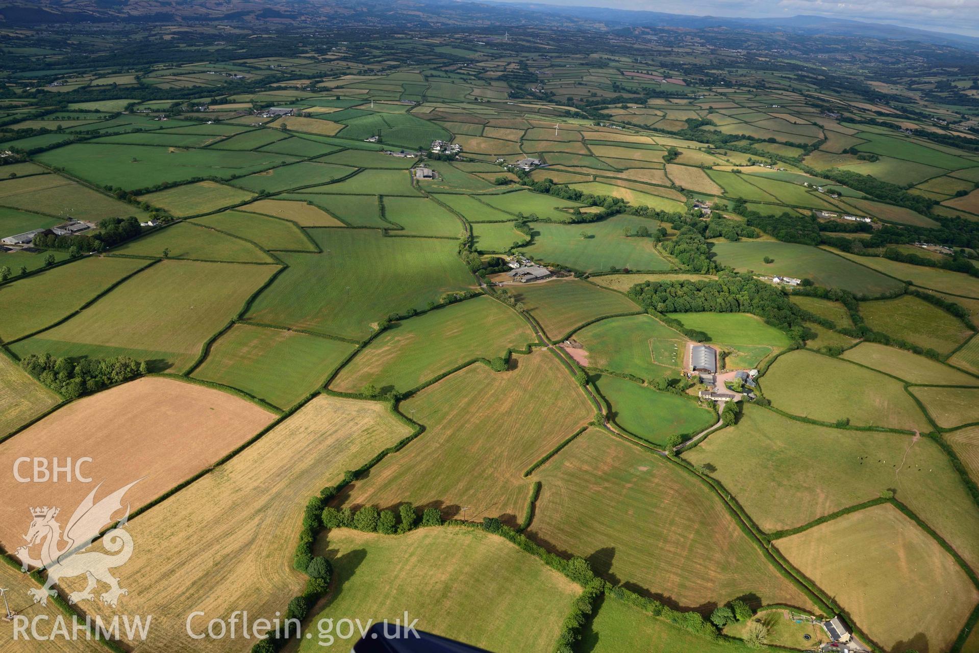 RCAHMW colour oblique aerial photograph of Roman road from Carmarthen to Kidwelly; view N from Fforest-isaf taken on 17 July 2018 by Toby Driver (NGR: SN421142)