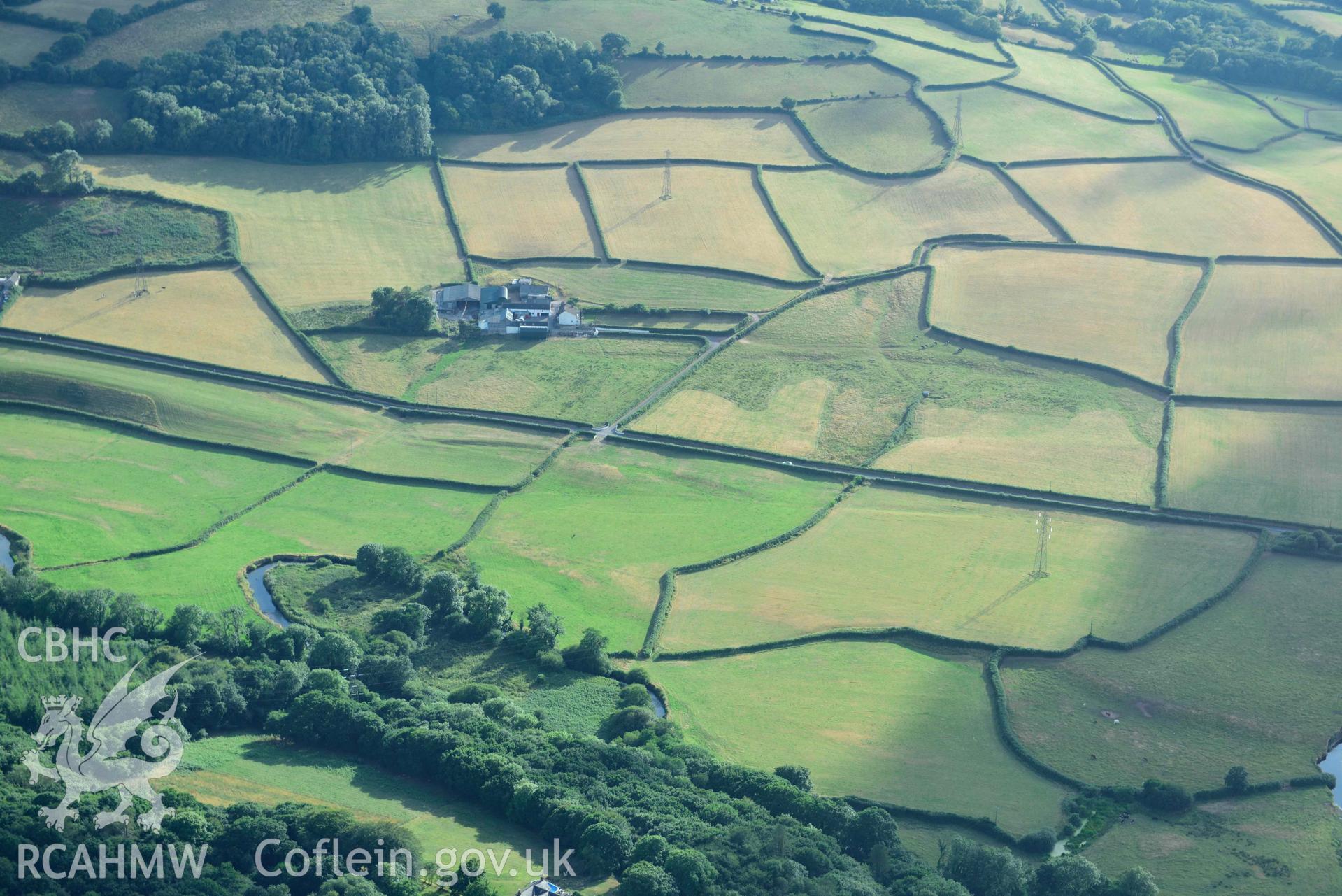 RCAHMW colour oblique aerial photograph of Roman road from Carmarthen to Kidwelly; road section Pontmorlais to Pant-glas taken on 17 July 2018 by Toby Driver (NGR: SN417097)