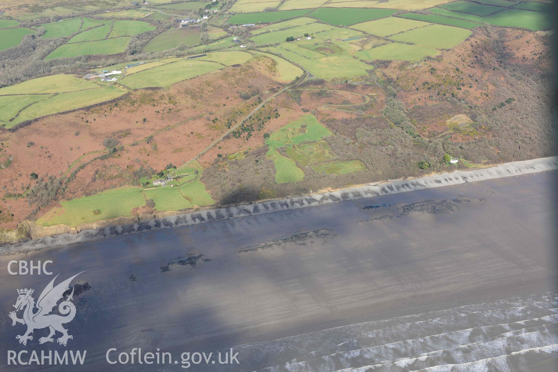 RCAHMW colour oblique aerial photograph of Marros Sands, peat deposits, view from S taken on 4 March 2022 by Toby Driver ((SN202074)