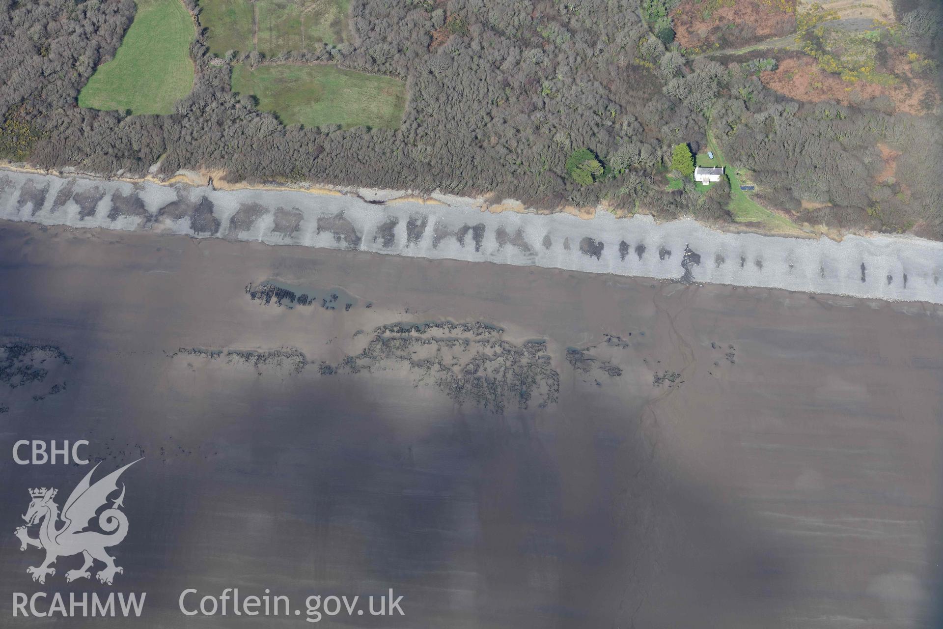 RCAHMW colour oblique aerial photograph of Marros Sands, peat deposits, south of Marros Mill taken on 4 March 2022 by Toby Driver ((SN206073)