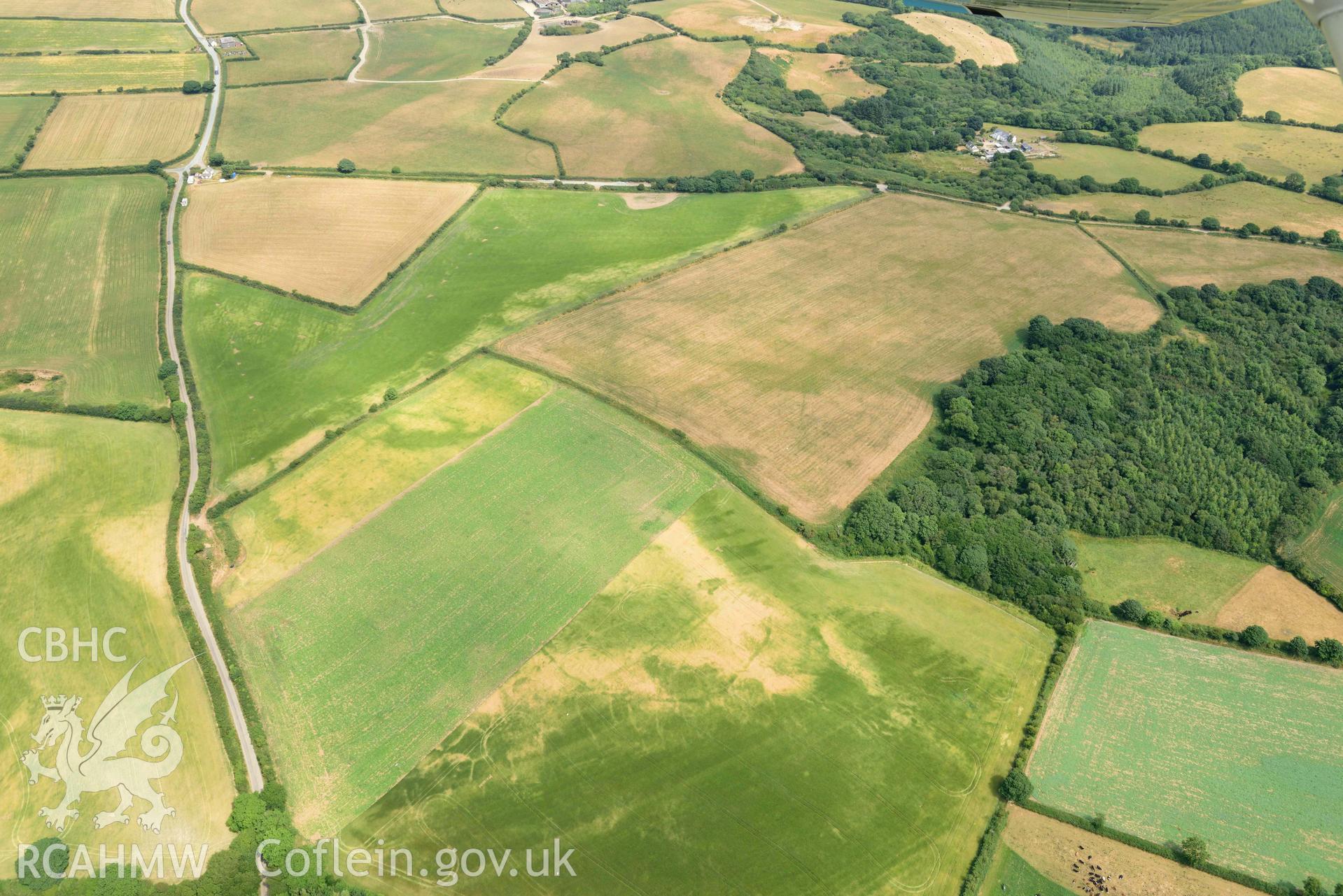 RCAHMW colour oblique aerial photograph of Round Barrows, Northeast of Dryslwyn taken on 11 July 2018 by Toby Driver