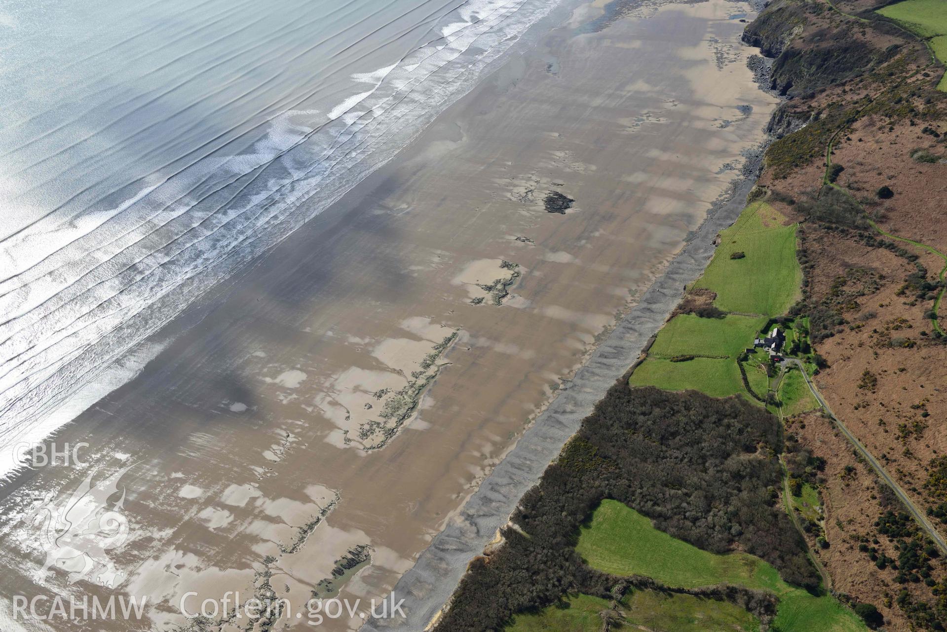 RCAHMW colour oblique aerial photograph of Marros Sands, peat deposits, south of Underhill taken on 4 March 2022 by Toby Driver ((SN202074)