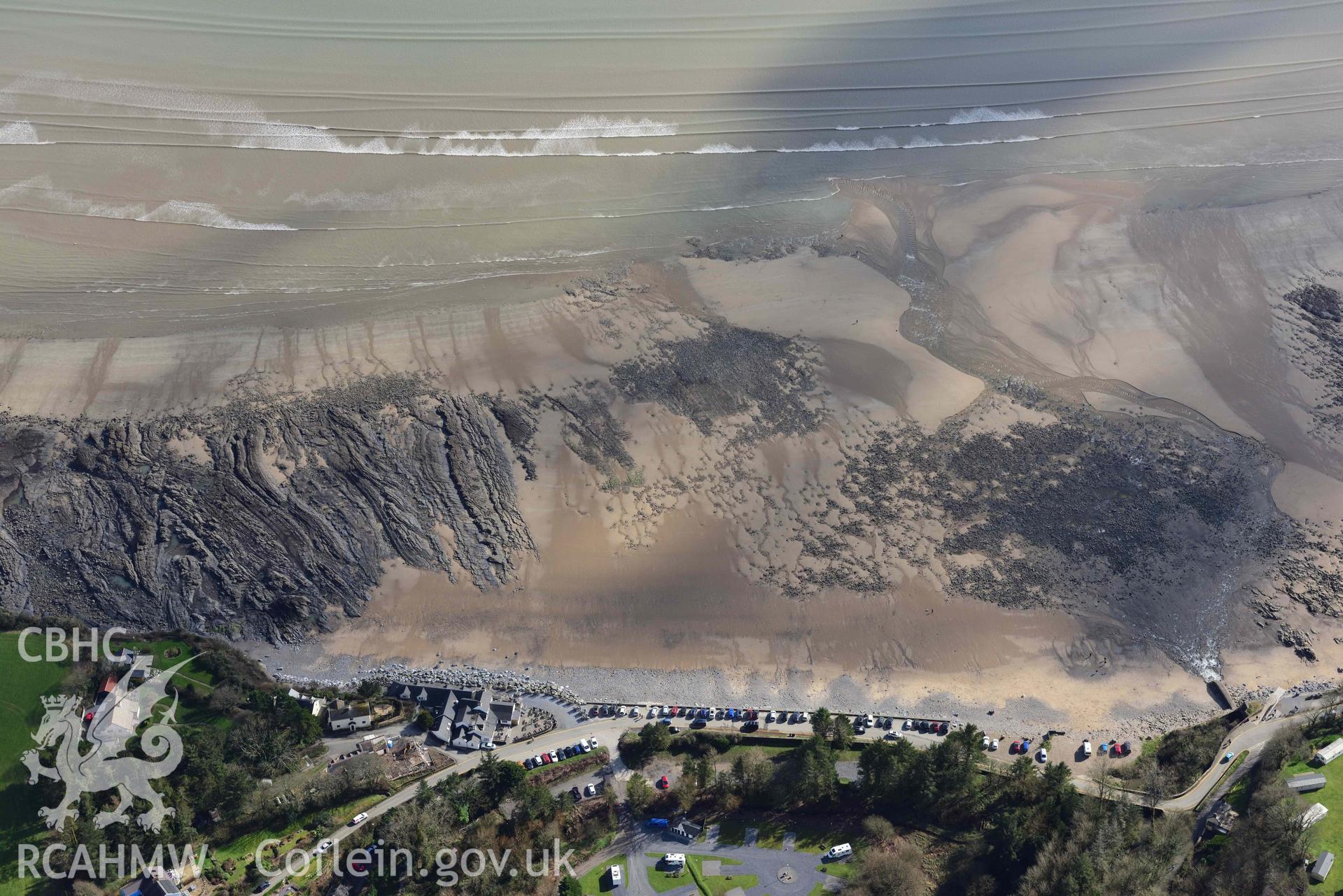 RCAHMW colour oblique aerial photograph of Wiseman's Bridge, coastal exposures following storms, looking east taken on 4 March 2022 by Toby Driver ((SN146060)