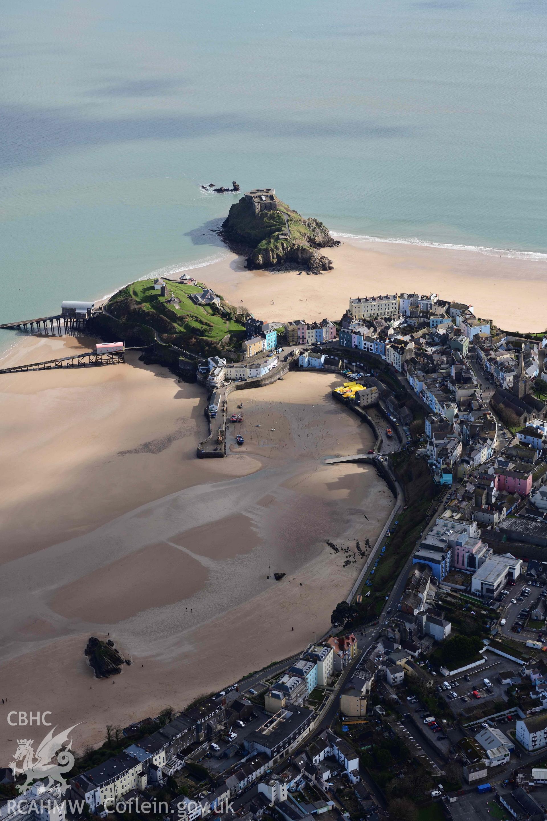 RCAHMW colour oblique aerial photograph of Tenby town and harbour, view from NW taken on 4 March 2022 by Toby Driver ((SN136005)