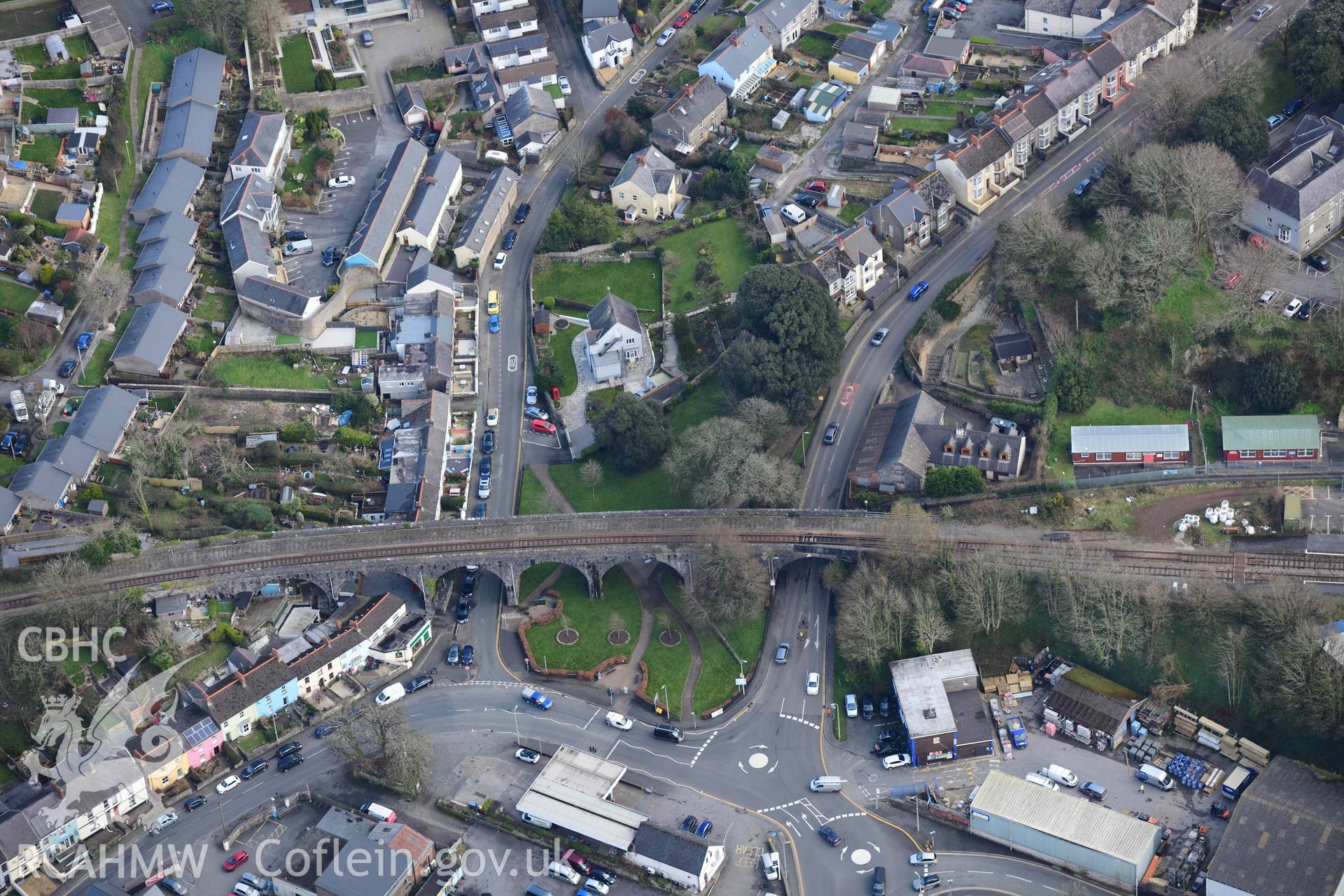 RCAHMW colour oblique aerial photograph of Tenby town, The Green railway viaduct taken on 4 March 2022 by Toby Driver ((SN129008)