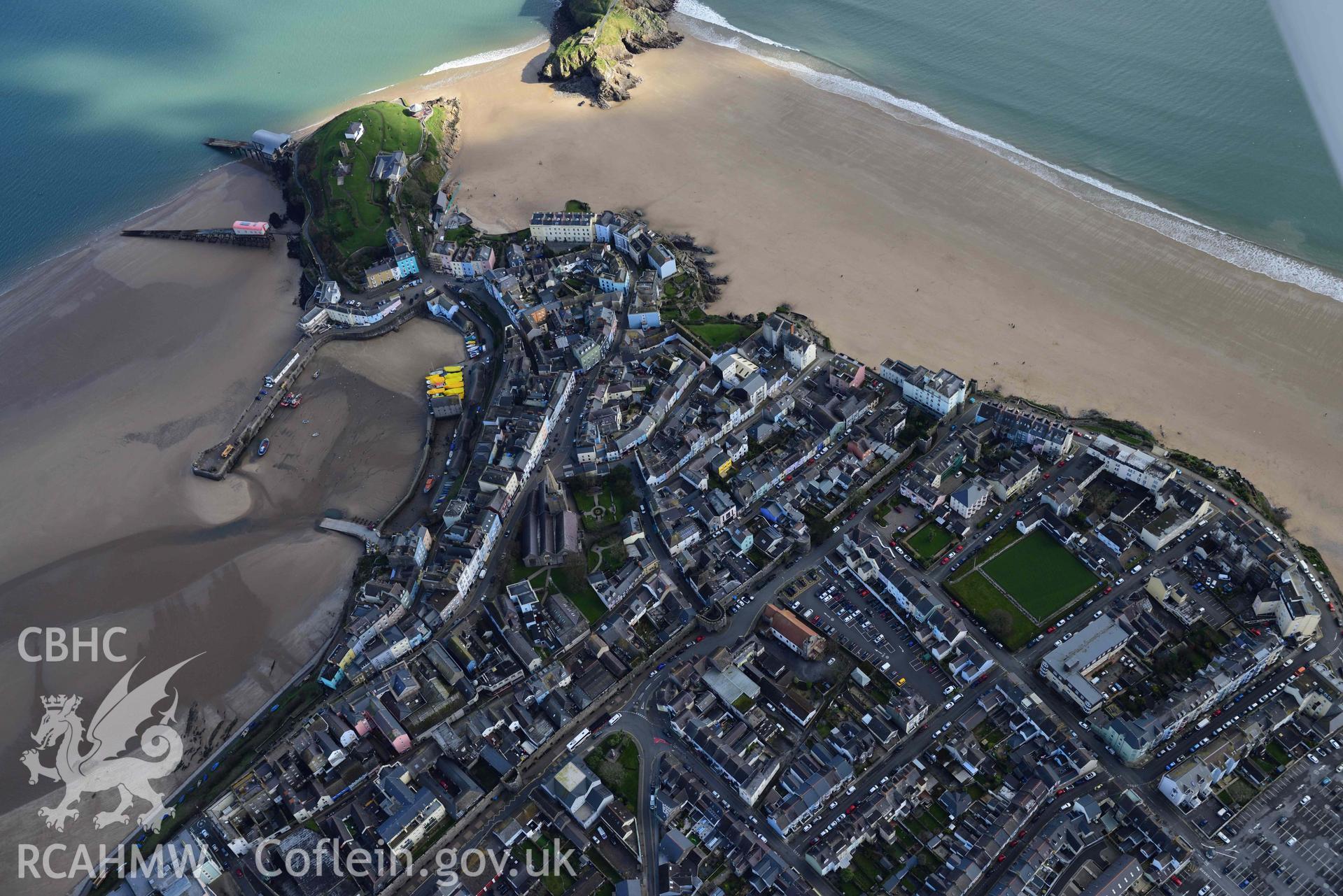 RCAHMW colour oblique aerial photograph of Tenby town and castle, view from W taken on 4 March 2022 by Toby Driver ((SN133003)