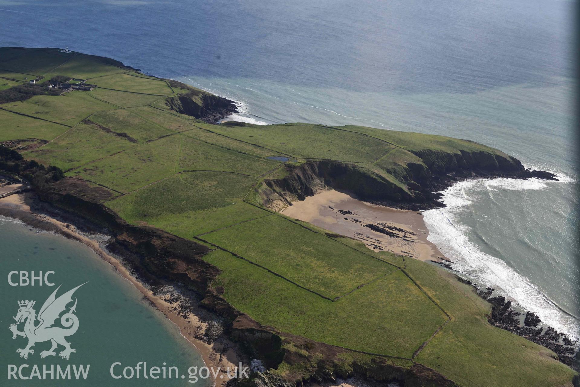 RCAHMW colour oblique aerial photograph of Caldey Island, Sandtop Bay taken on 4 March 2022 by Toby Driver ((SS131966)