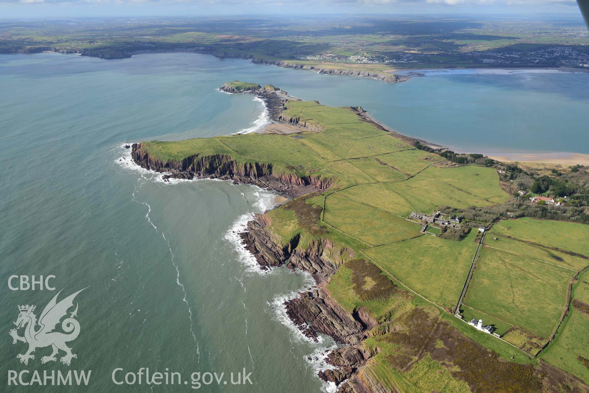 RCAHMW colour oblique aerial photograph of Caldey Island, landscape looking NW taken on 4 March 2022 by Toby Driver ((SS140963)