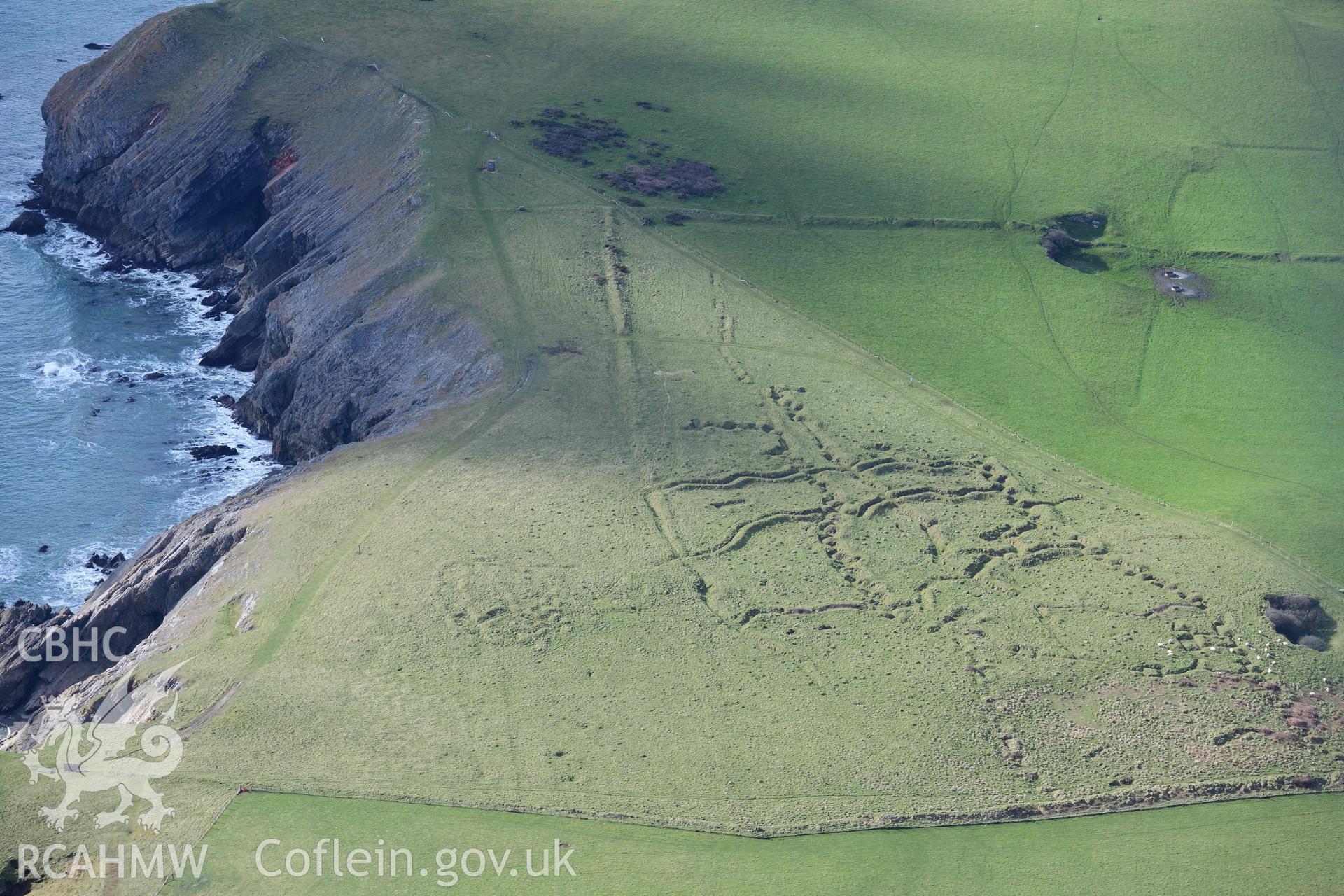 RCAHMW colour oblique aerial photograph of Penally First World War practice trenches, in winter light taken on 4 March 2022 by Toby Driver ((SS112985)