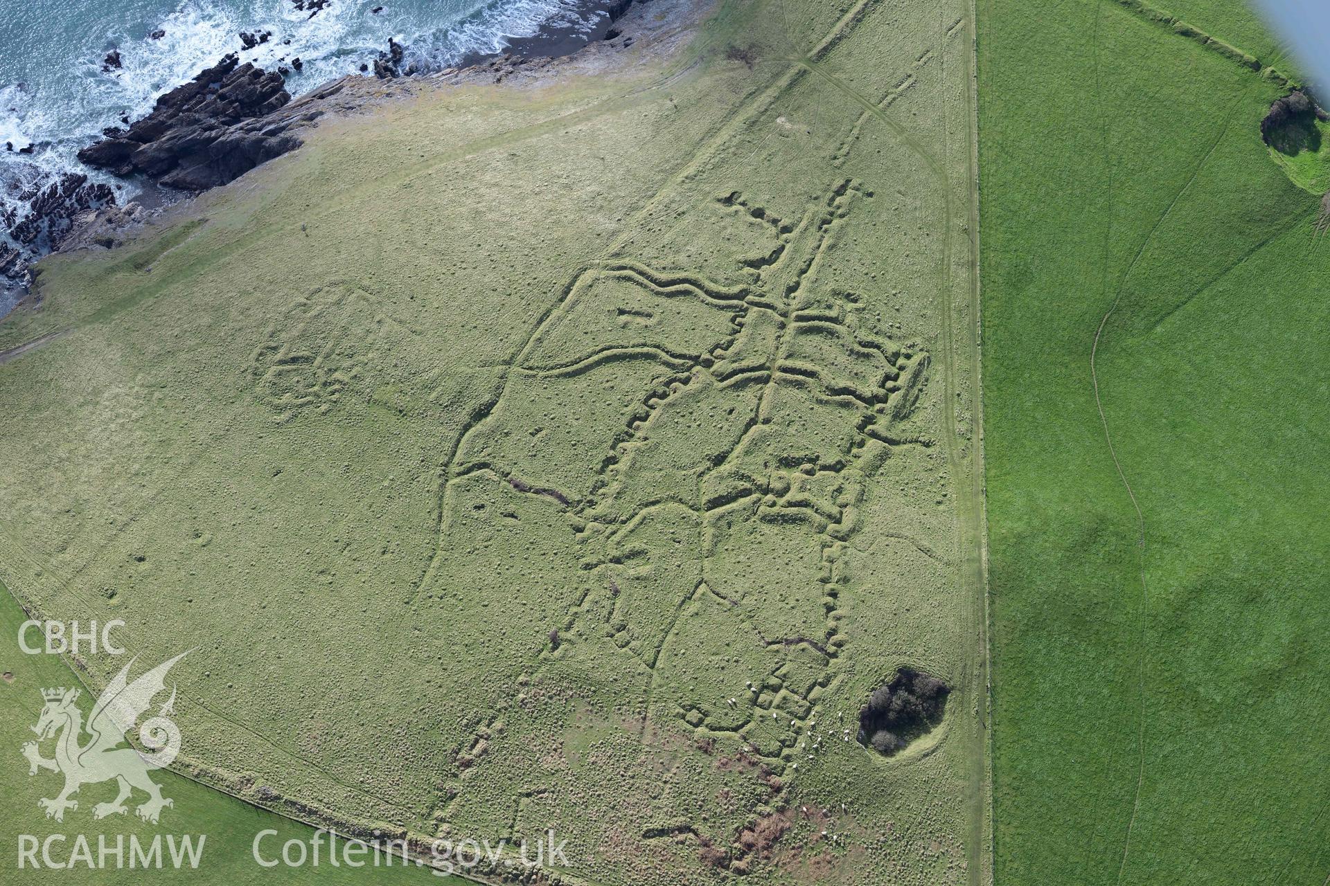 RCAHMW colour oblique aerial photograph of Penally First World War practice trenches, in winter light taken on 4 March 2022 by Toby Driver ((SS112985)