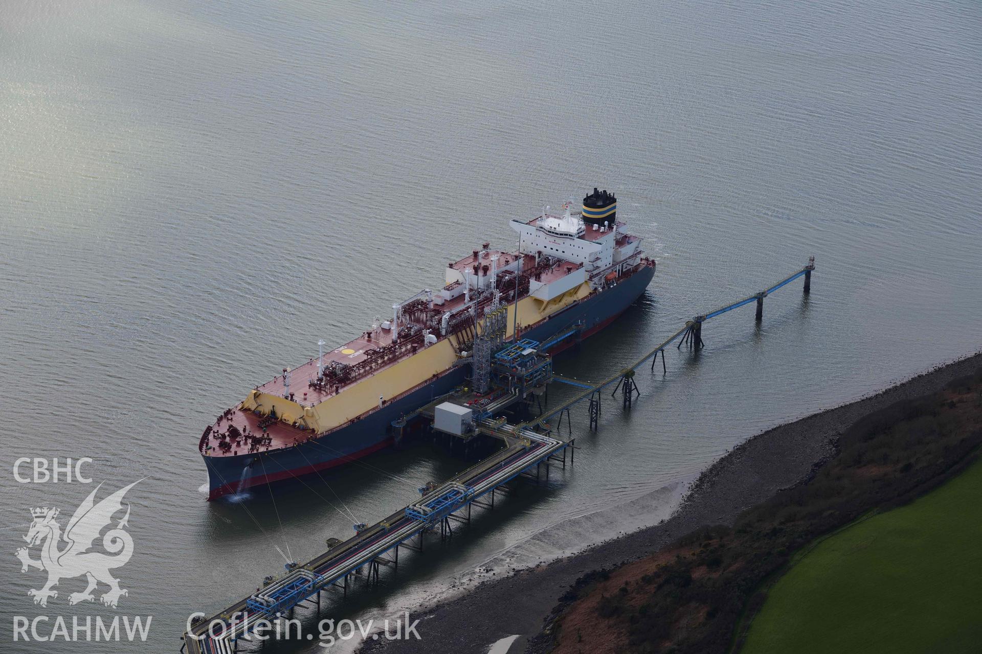 RCAHMW colour oblique aerial photograph of Milford Haven Waterway; tanker at Waterston jetties taken on 4 March 2022 by Toby Driver ((SM926044)