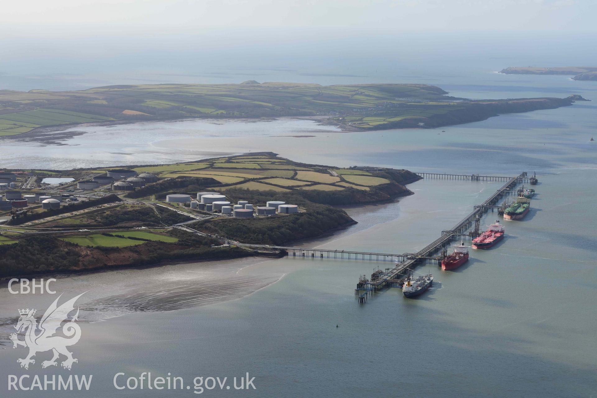 RCAHMW colour oblique aerial photograph of Milford Haven Waterway; Bullwell Bay Jetty taken on 4 March 2022 by Toby Driver ((SM907042)