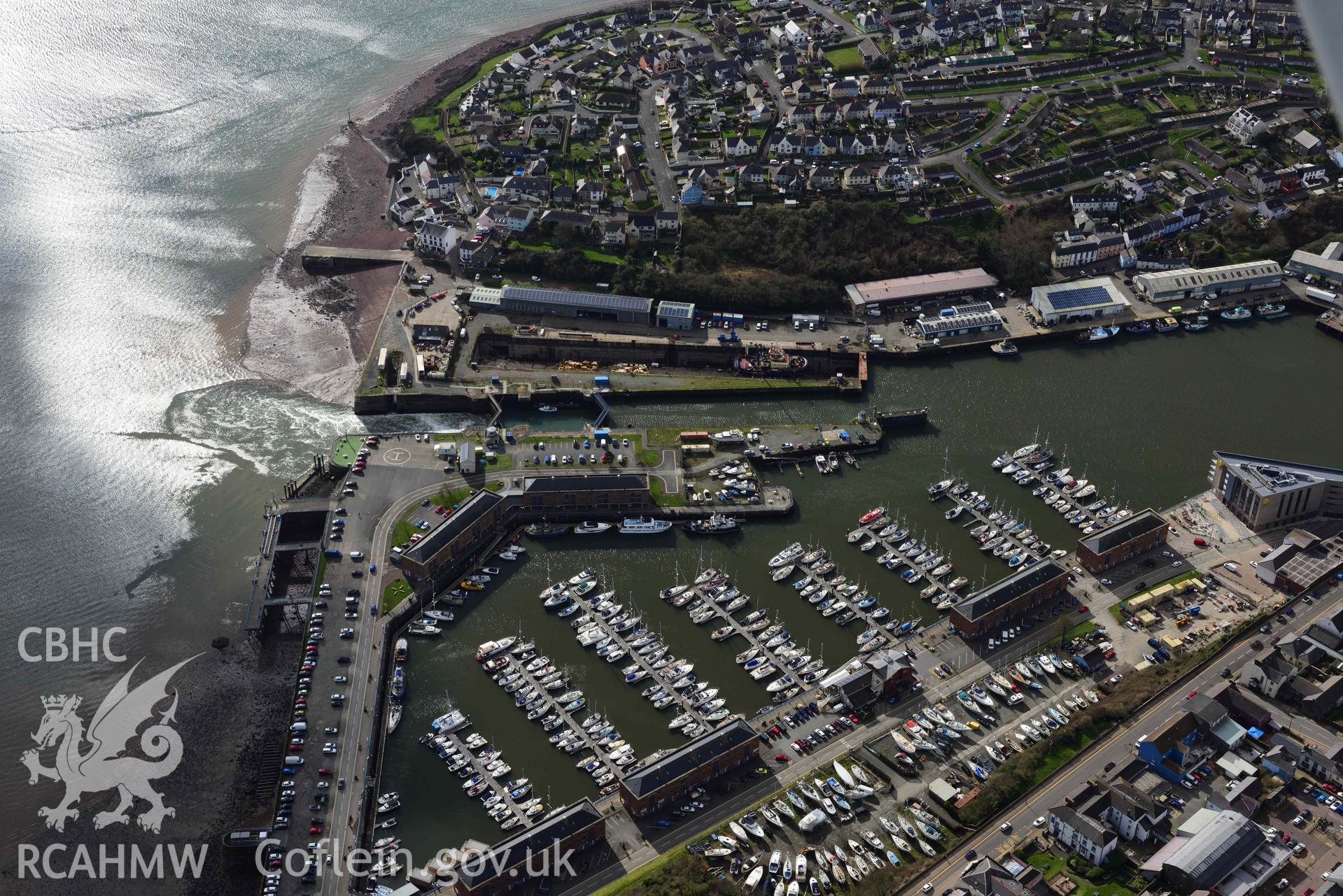 RCAHMW colour oblique aerial photograph of Milford Haven Docks taken on 4 March 2022 by Toby Driver ((SM901057)