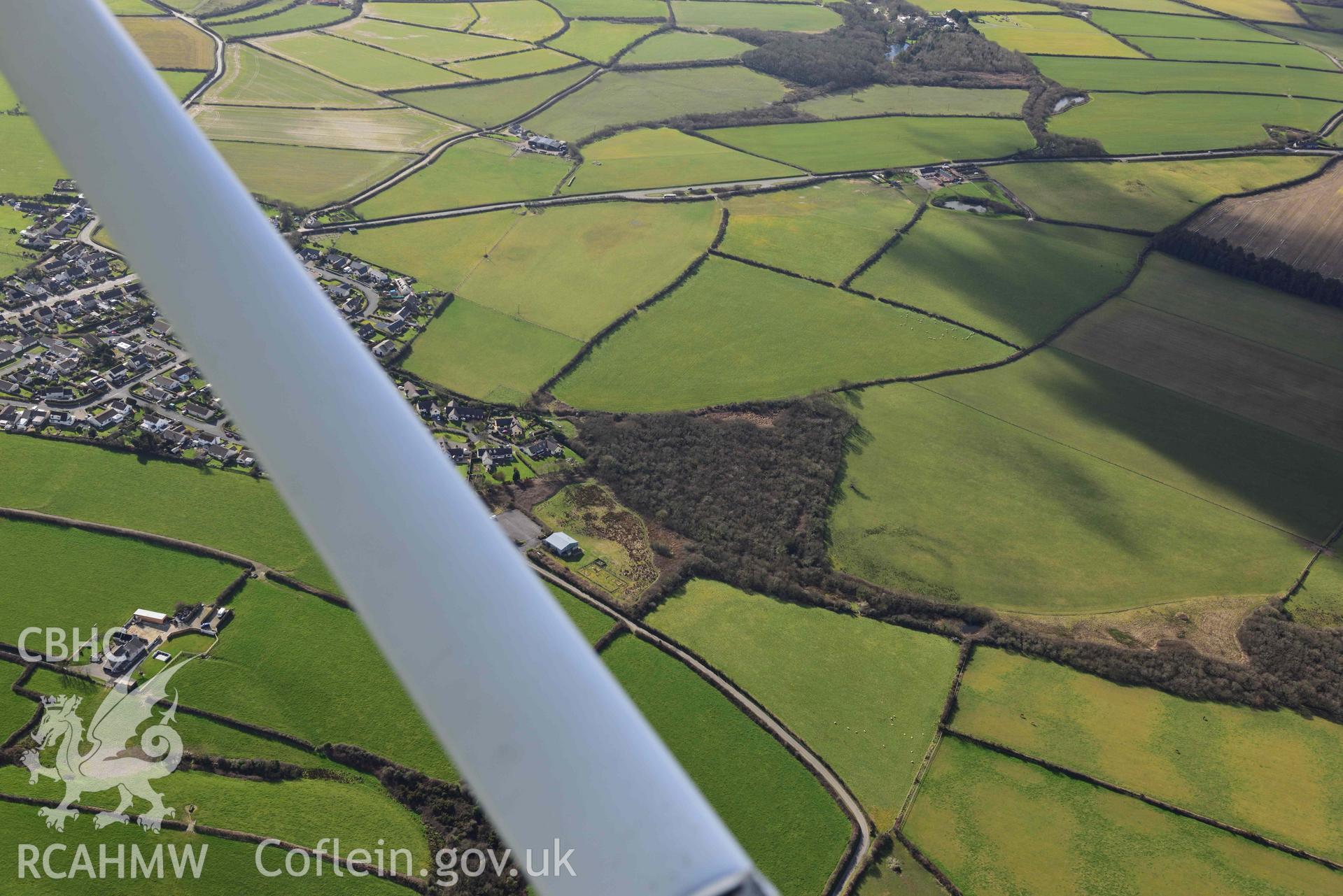 RCAHMW colour oblique aerial photograph of Simpson Cross inland promontory fort taken on 4 March 2022 by Toby Driver ((SM890199)