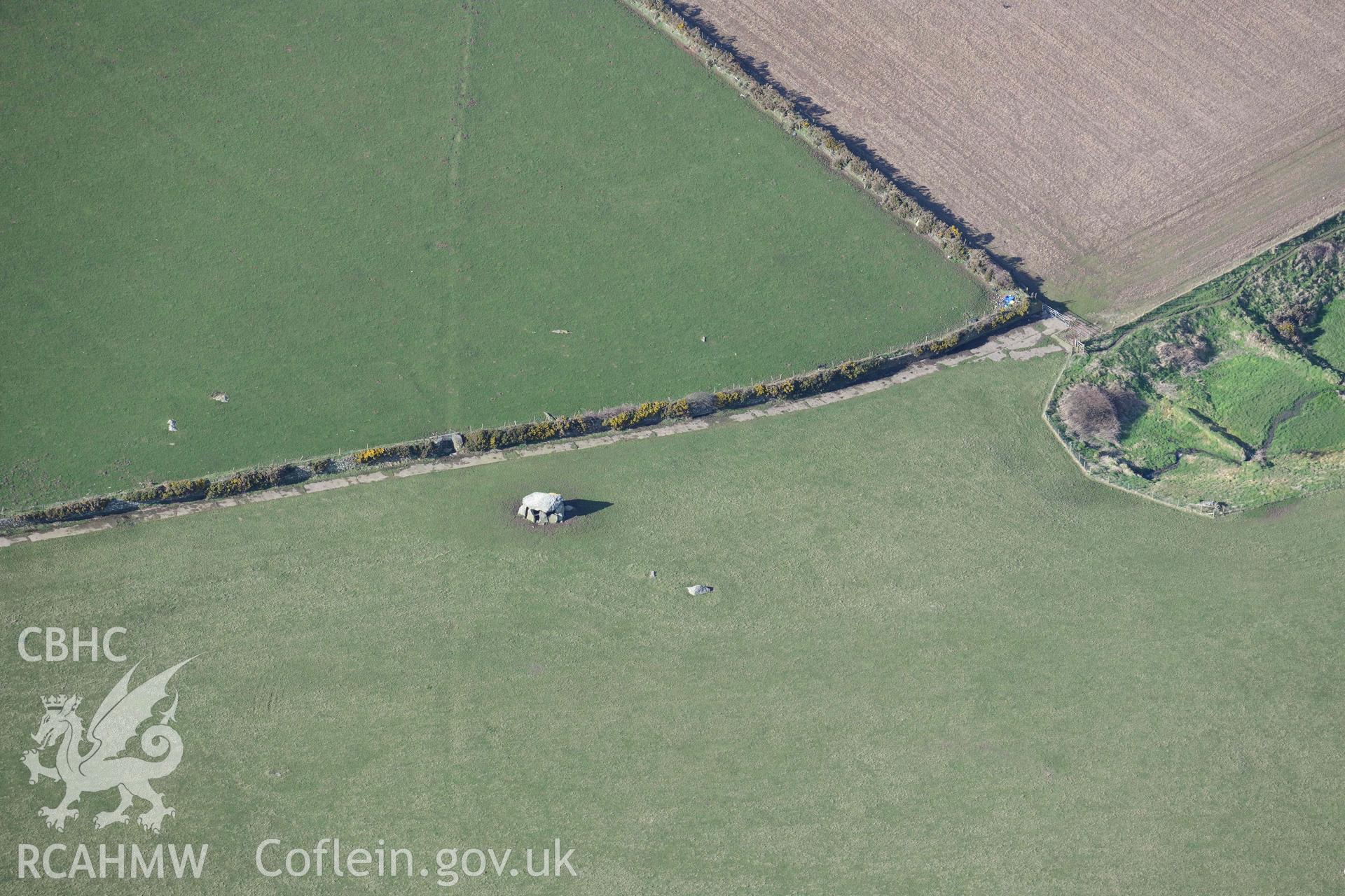 RCAHMW colour oblique aerial photograph of Carreg Sampson burial chamber taken on 4 March 2022 by Toby Driver ((SM848335)