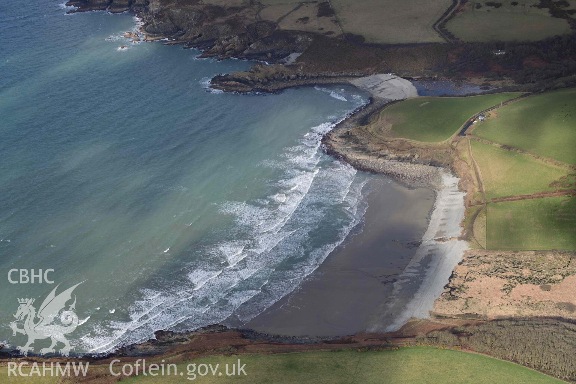 RCAHMW colour oblique aerial photograph of Aber Mawr beach, site of flint scatter taken on 4 March 2022 by Toby Driver ((SM882346)