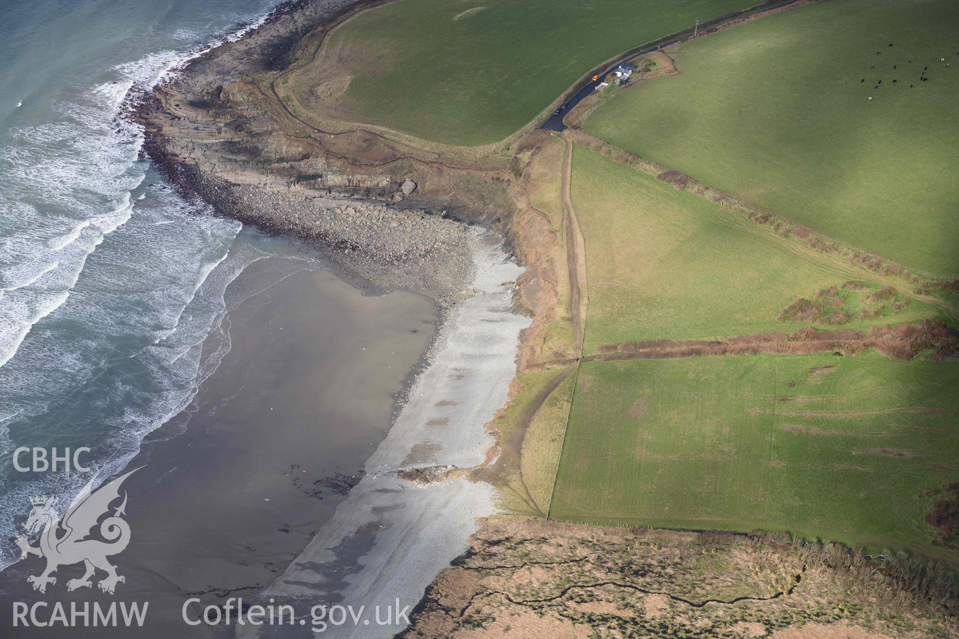 RCAHMW colour oblique aerial photograph of Aber Mawr beach, site of flint scatter taken on 4 March 2022 by Toby Driver ((SM882346)