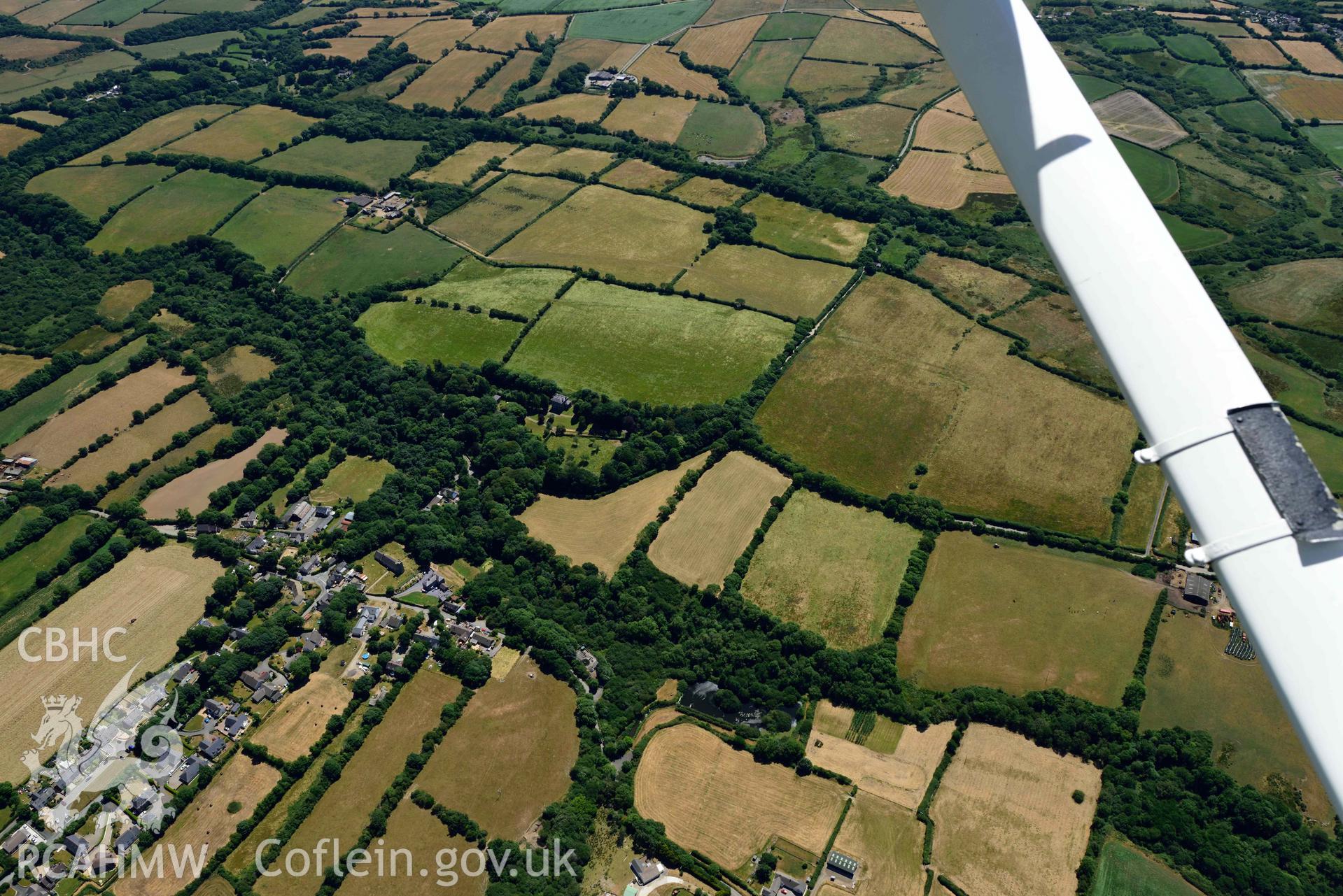 RCAHMW colour oblique aerial photograph of  Camrose village taken on 9 July 2018 by Toby Driver