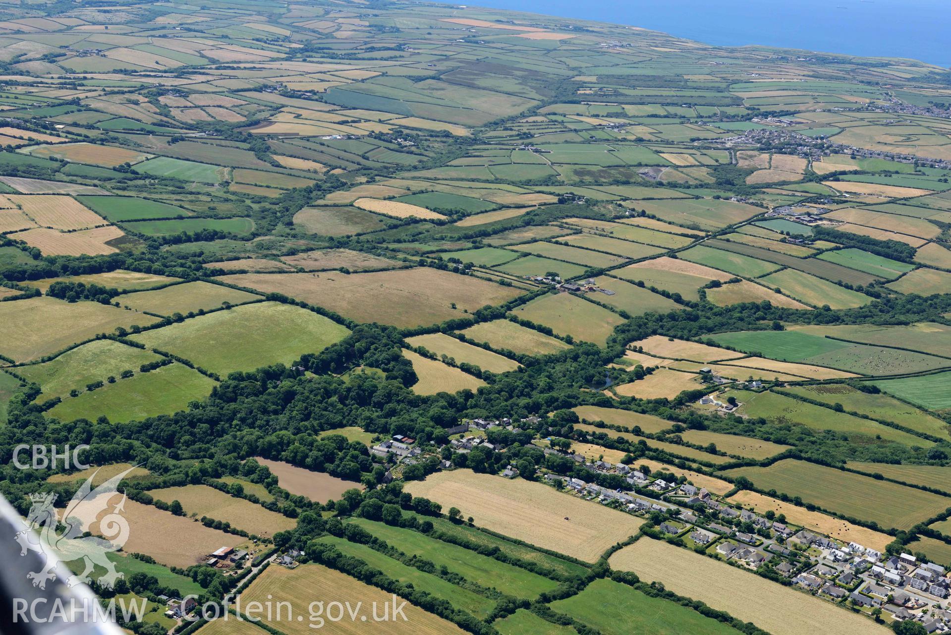 RCAHMW colour oblique aerial photograph of  Camrose village taken on 9 July 2018 by Toby Driver