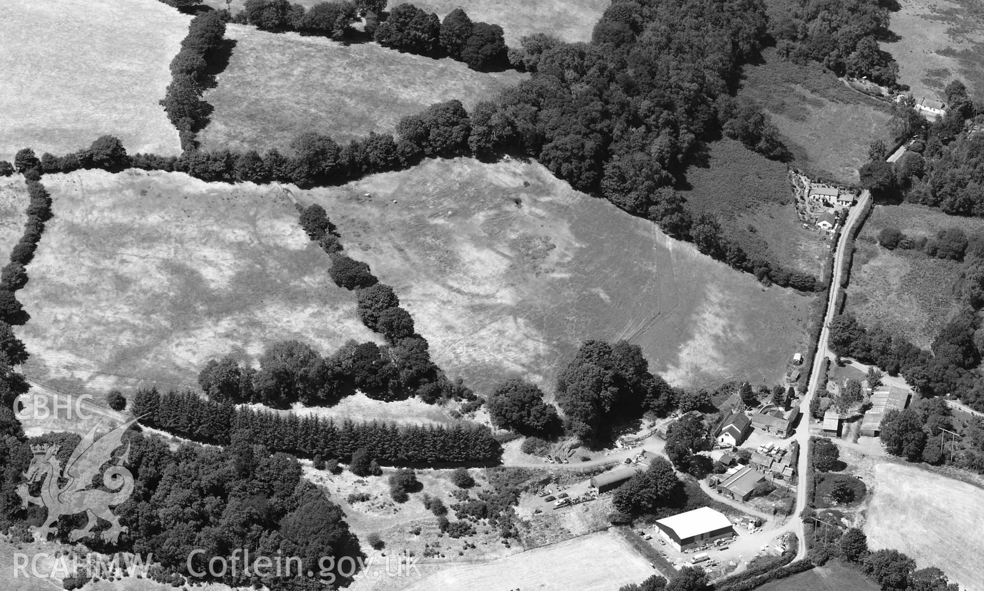 RCAHMW black and white oblique aerial photograph of Aberhoffnant complex enclosure ( SN393402 ) taken on 9 July 2018 by Toby Driver