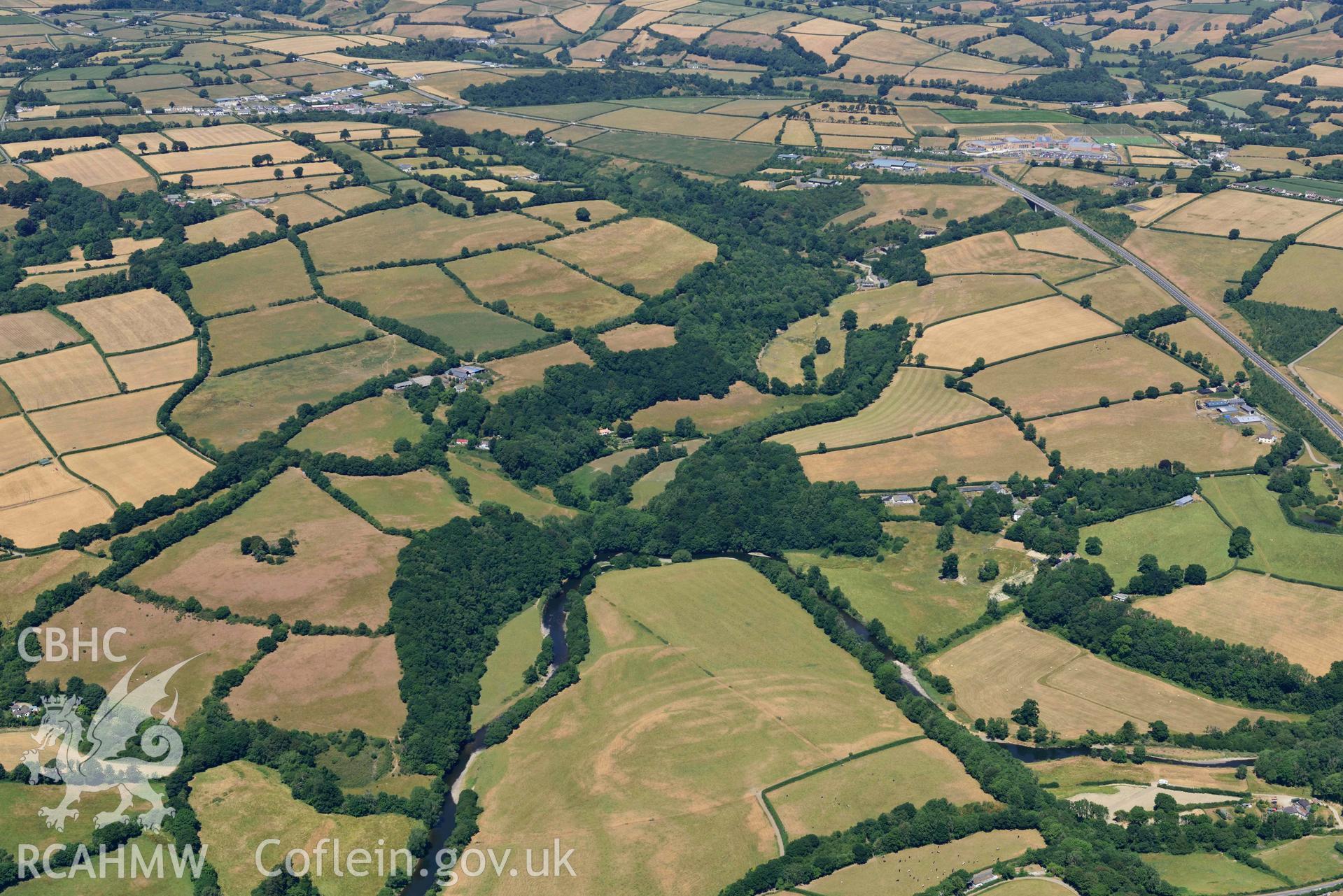 RCAHMW colour oblique aerial photograph of Allt isaf defended enclosure taken on 9 July 2018 by Toby Driver