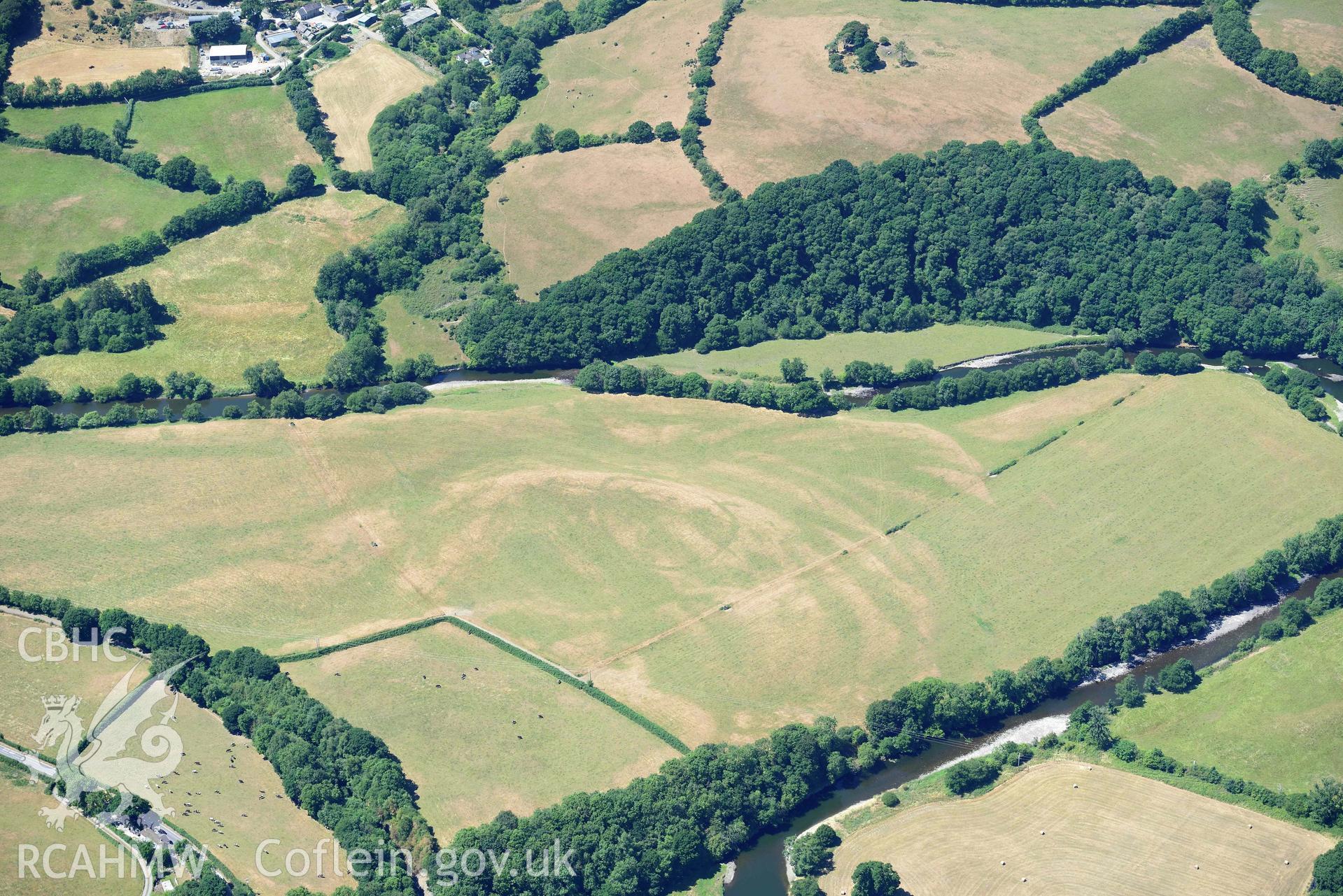 RCAHMW colour oblique aerial photograph of Allt isaf defended enclosure taken on 9 July 2018 by Toby Driver