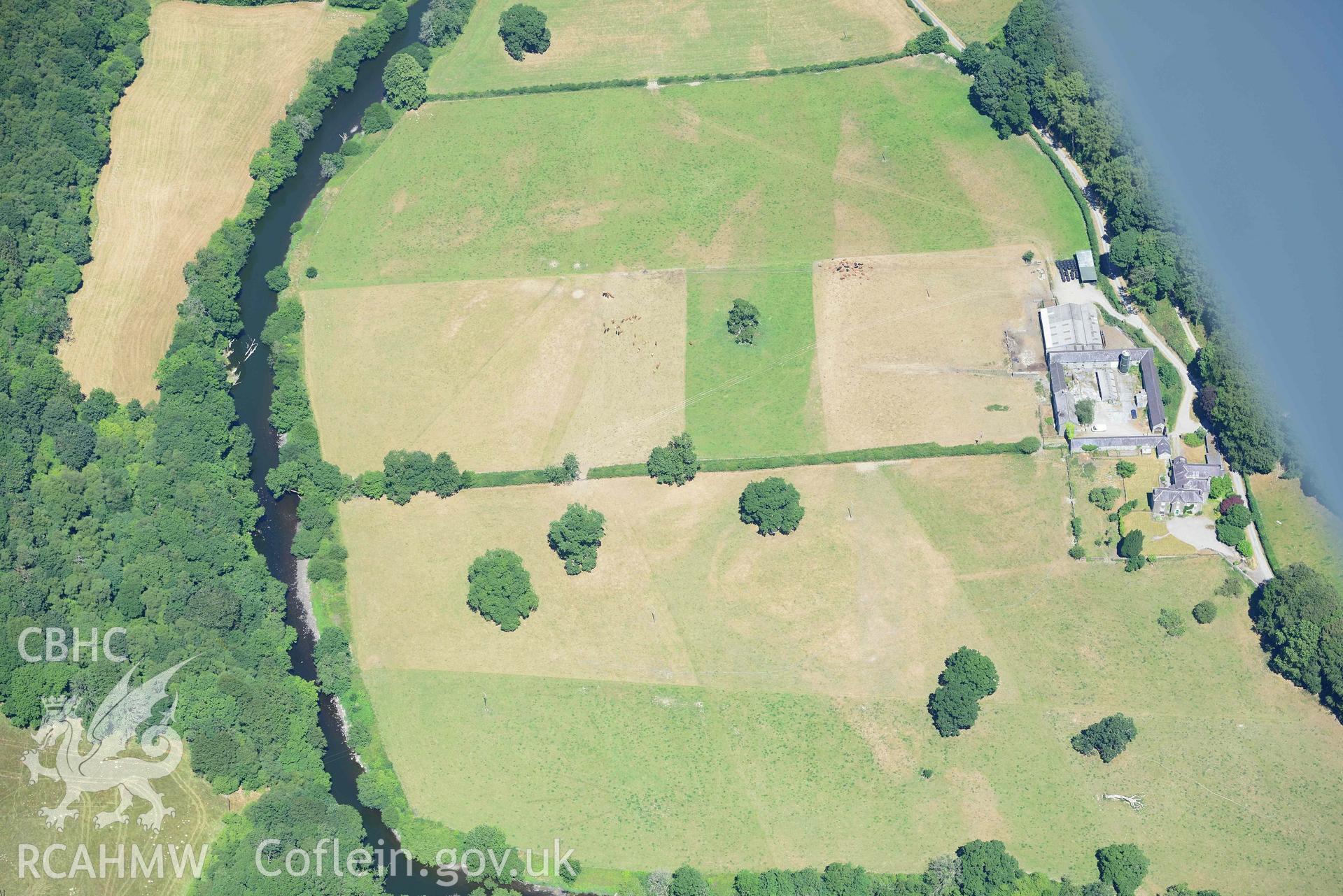 RCAHMW colour oblique aerial photograph of Llanfair Farm defended enclosure taken on 9 July 2018 by Toby Driver