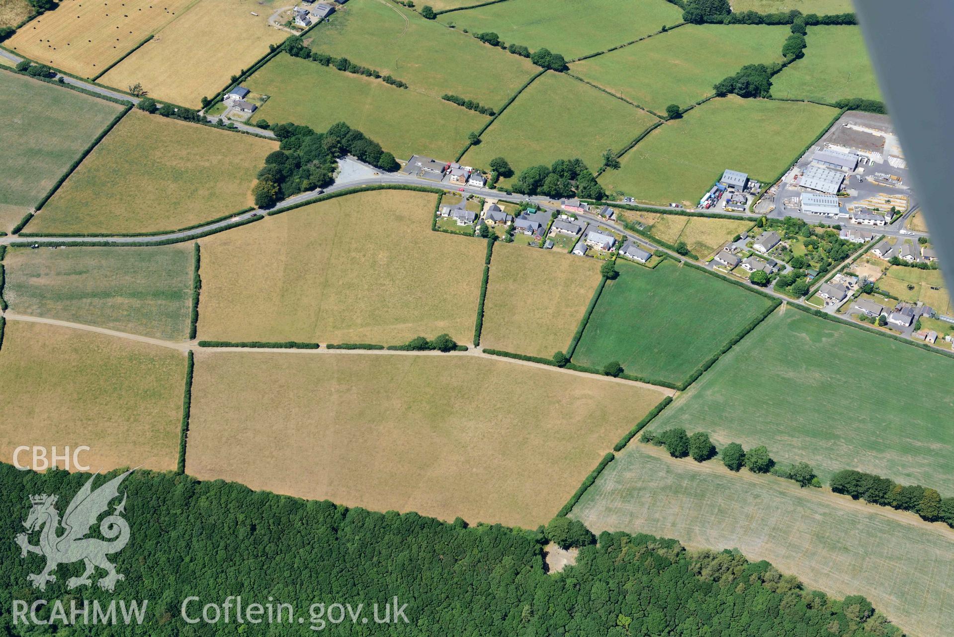 RCAHMW colour oblique aerial photograph of Llanllwni Roman Road and Llanllwni enclosure or watchtower taken on 9 July 2018 by Toby Driver