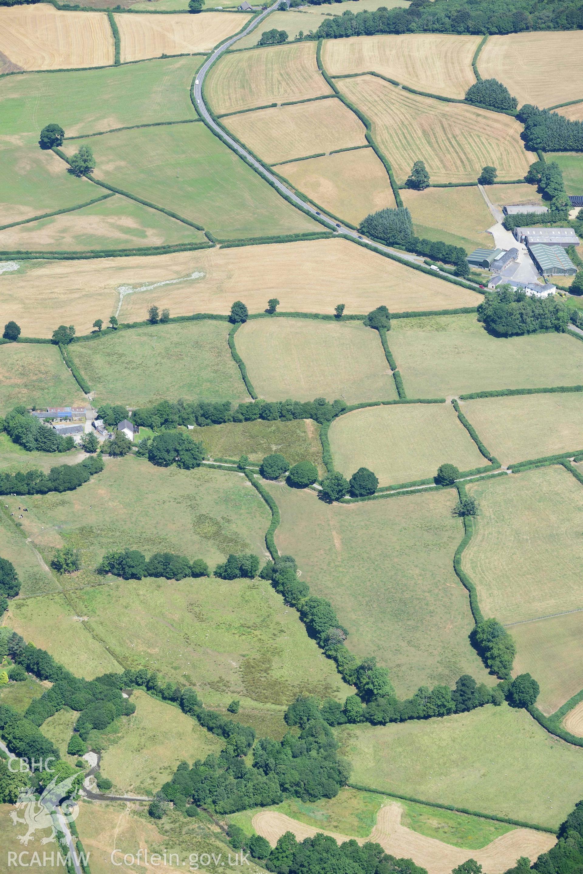 RCAHMW colour oblique aerial photograph of Aber Giar Roman Road and pits taken on 9 July 2018 by Toby Driver