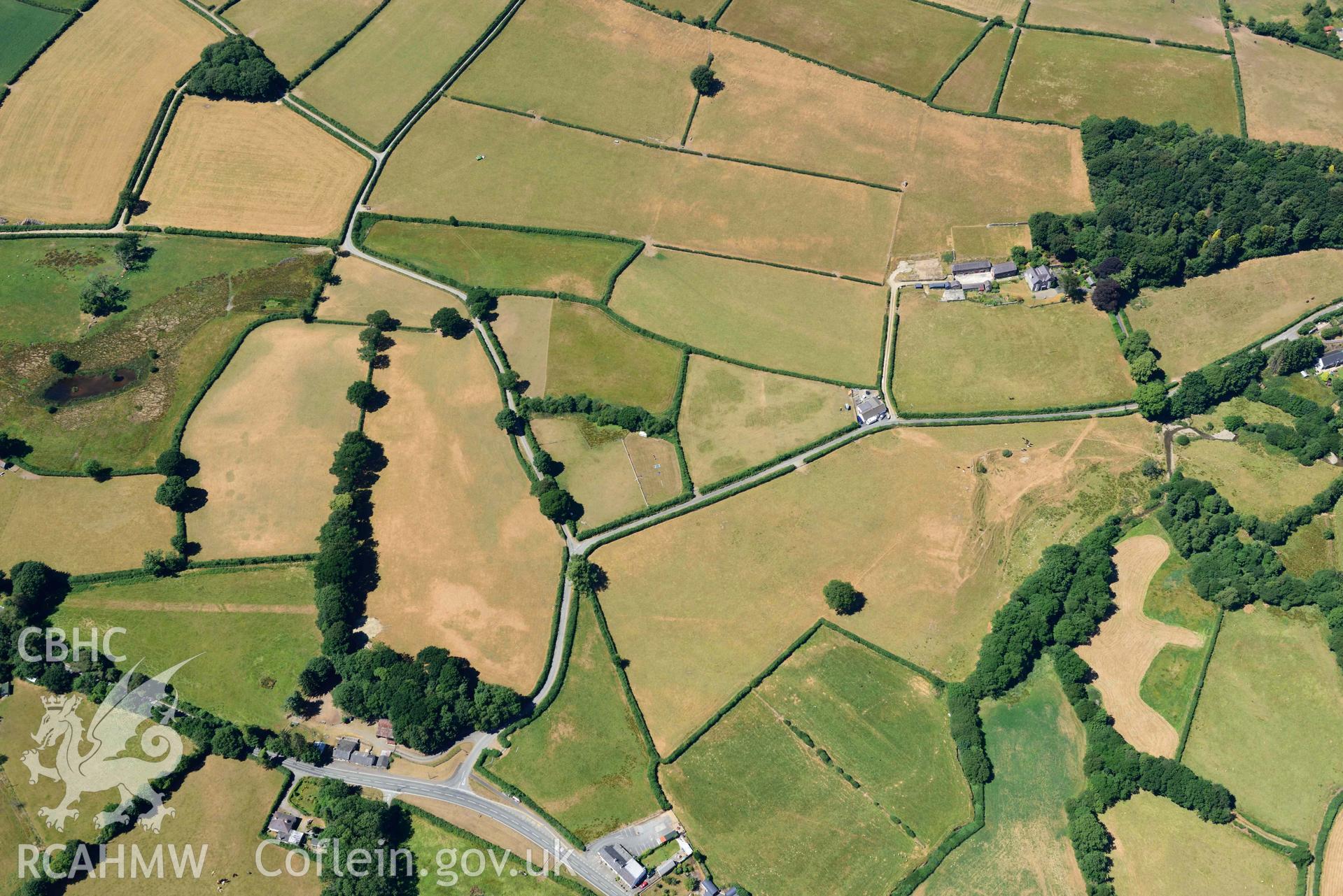 RCAHMW colour oblique aerial photograph of Aber Giar Roman Road and pits taken on 9 July 2018 by Toby Driver