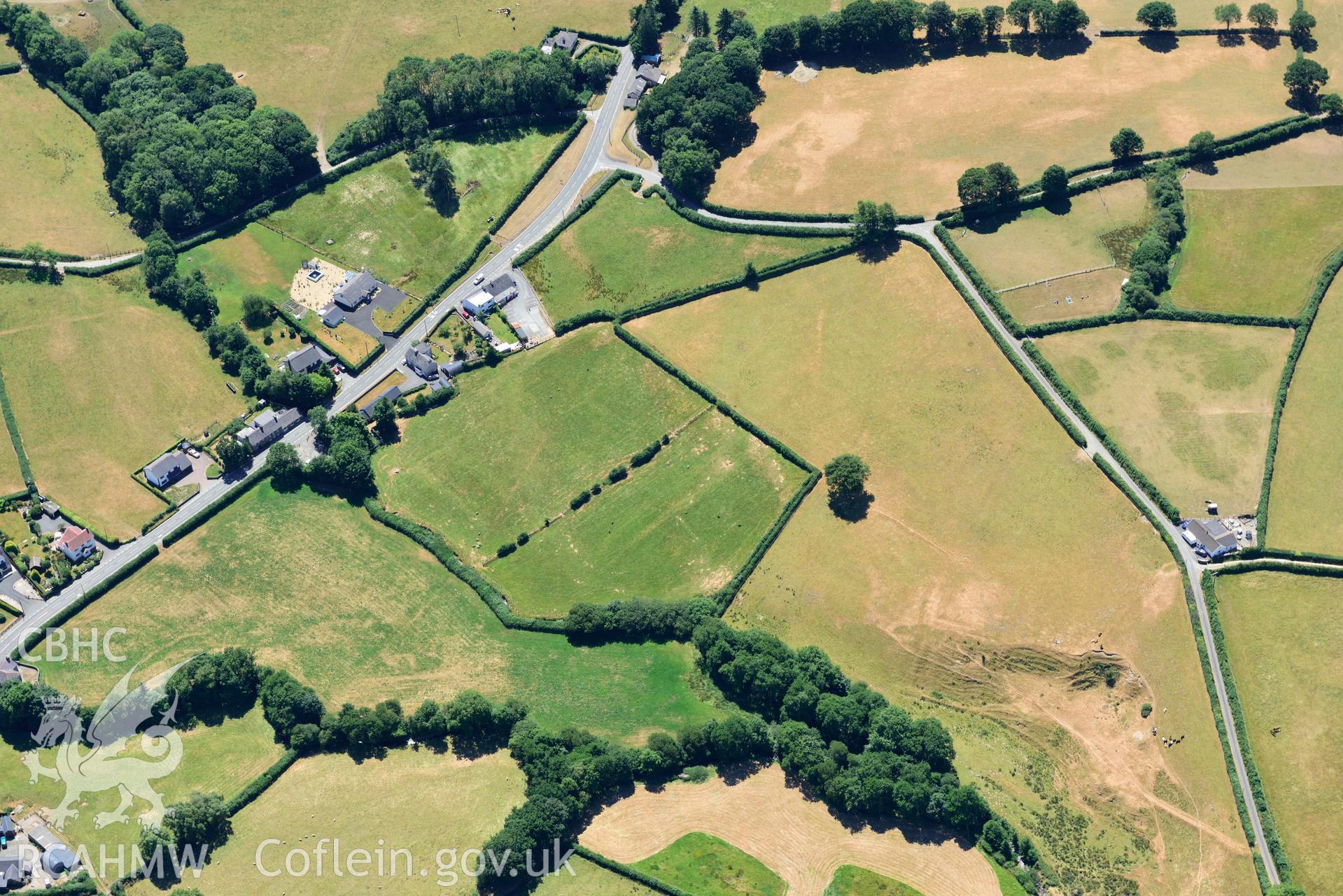 RCAHMW colour oblique aerial photograph of Aber Giar Roman Road and pits taken on 9 July 2018 by Toby Driver